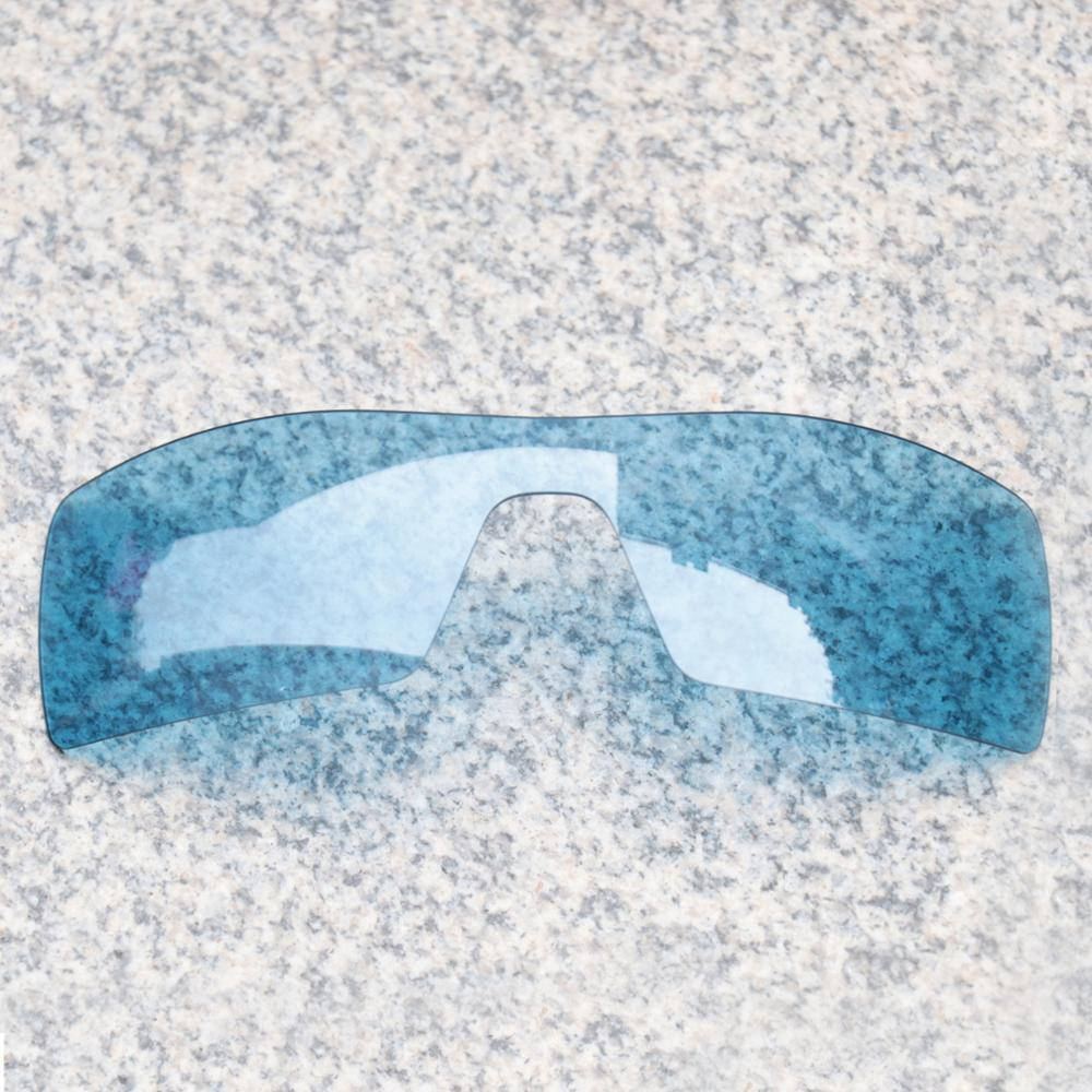 Oakley, blue-tinted sports sunglass lens, speckled granite surface, SD Desktop Wallpaper