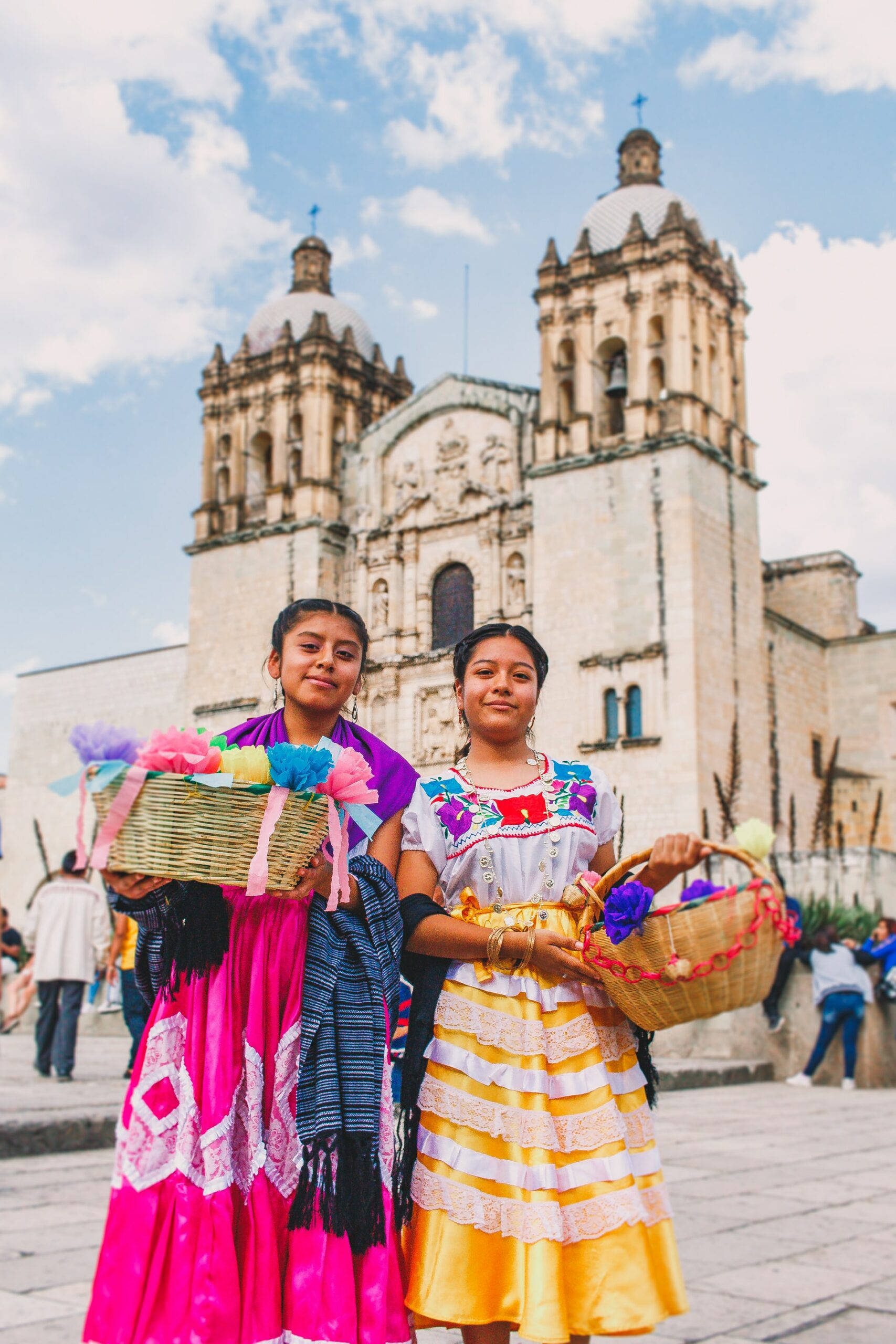 traditional dress in Oaxaca, vibrant traditional dresses, colorful woven baskets, 2K Phone Wallpaper