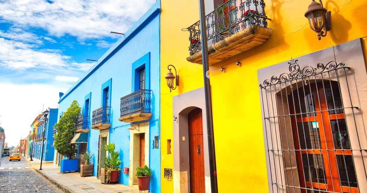 Oaxaca, colorful residences, vibrant blue and yellow colonial buildings, SD Desktop Wallpaper