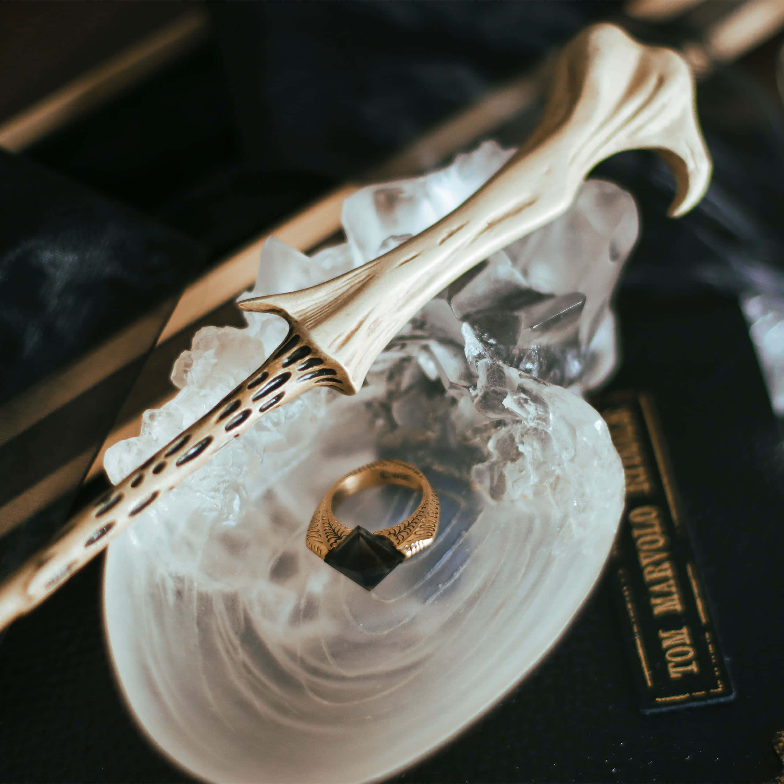 bone-like wand, gold ring with black stone, clear crystal bowl, 2K Desktop Wallpaper