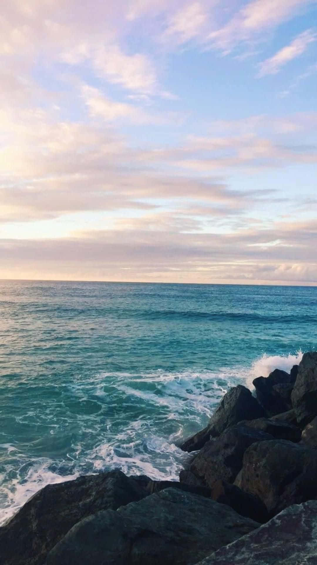 ocean sunrise, turquoise ocean waves, dark rocks, Full HD Phone Wallpaper