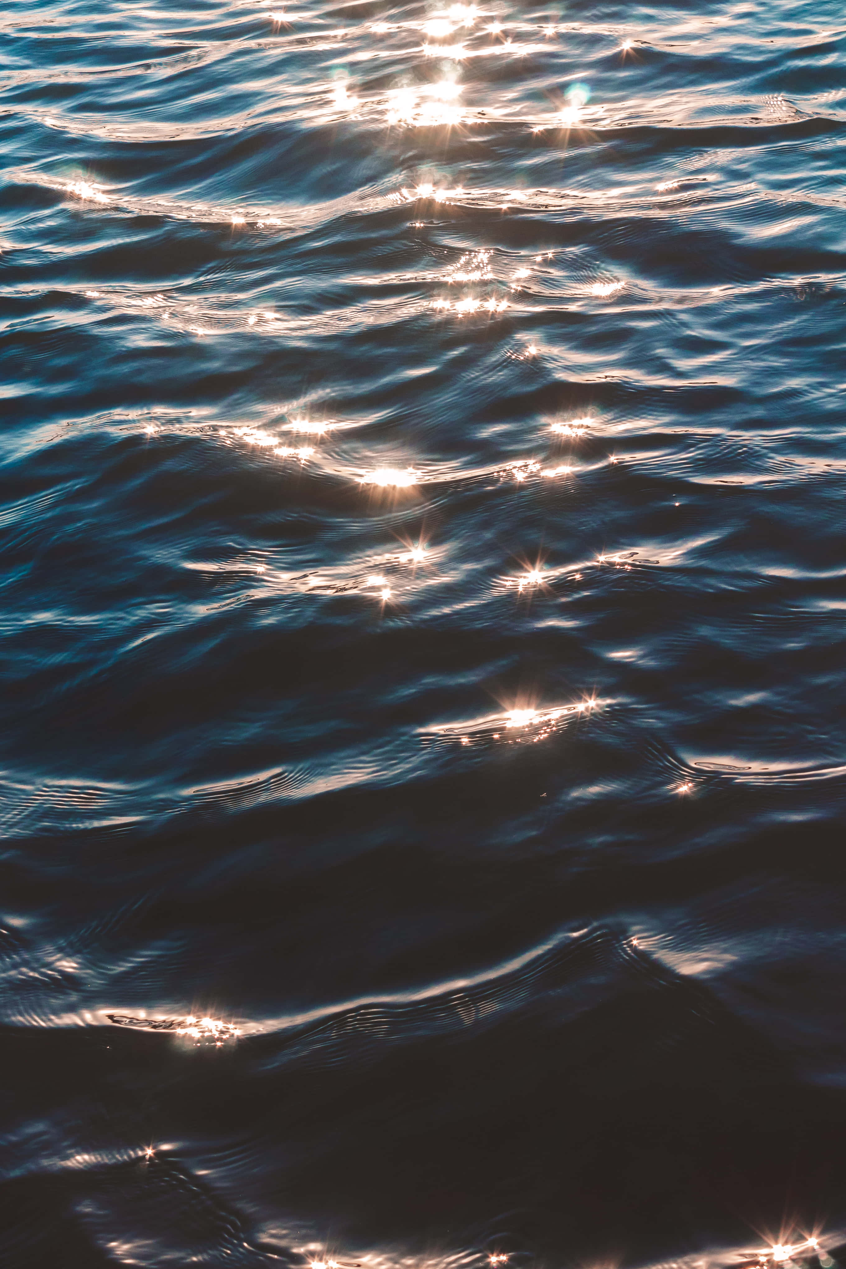 ocean aesthetic phone, deep blue ocean waves, sunlight glitters, 4K Phone Wallpaper