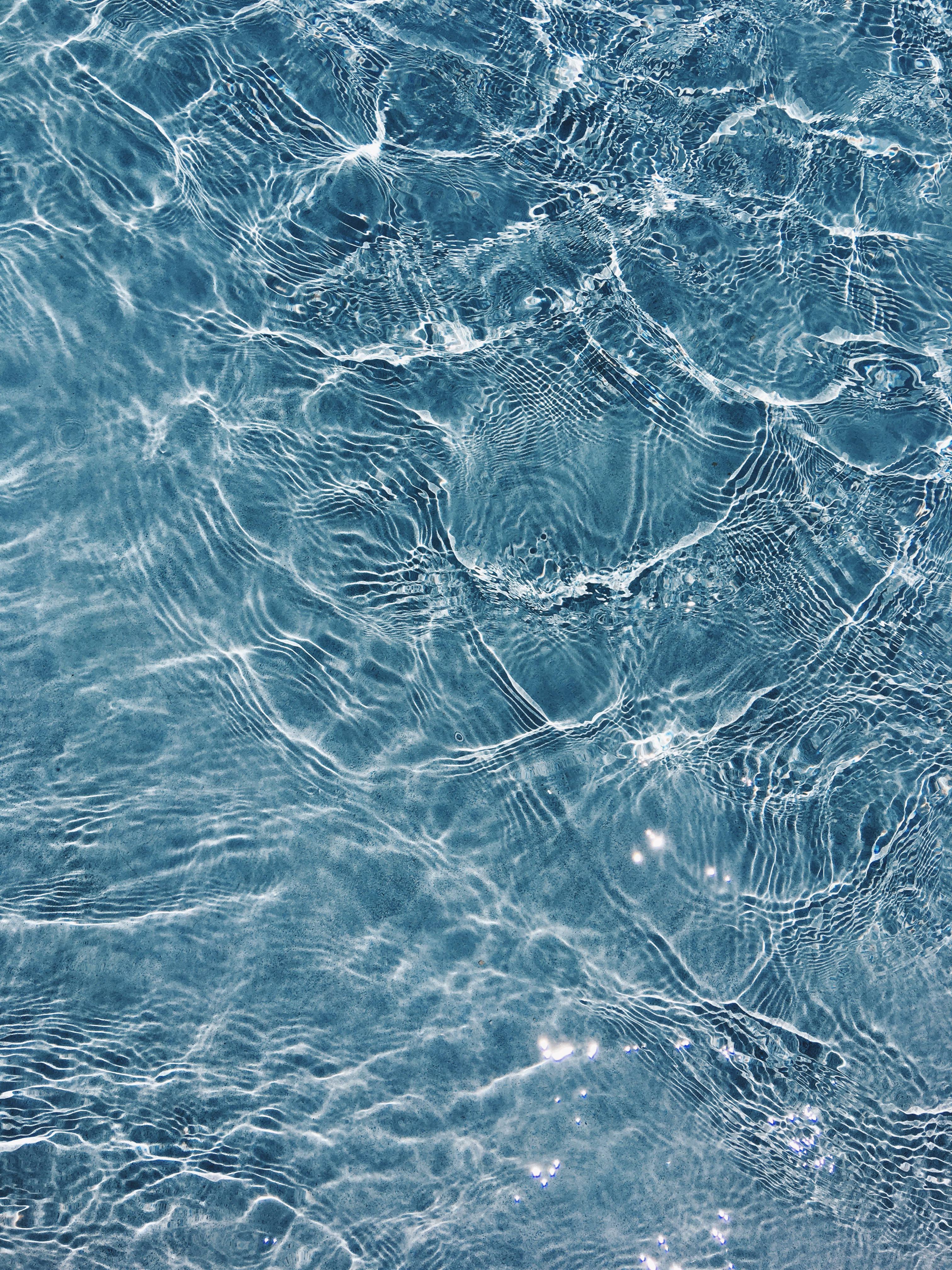 rippling blue water, sunlight, patterns of light and shadow, 4K Phone Wallpaper