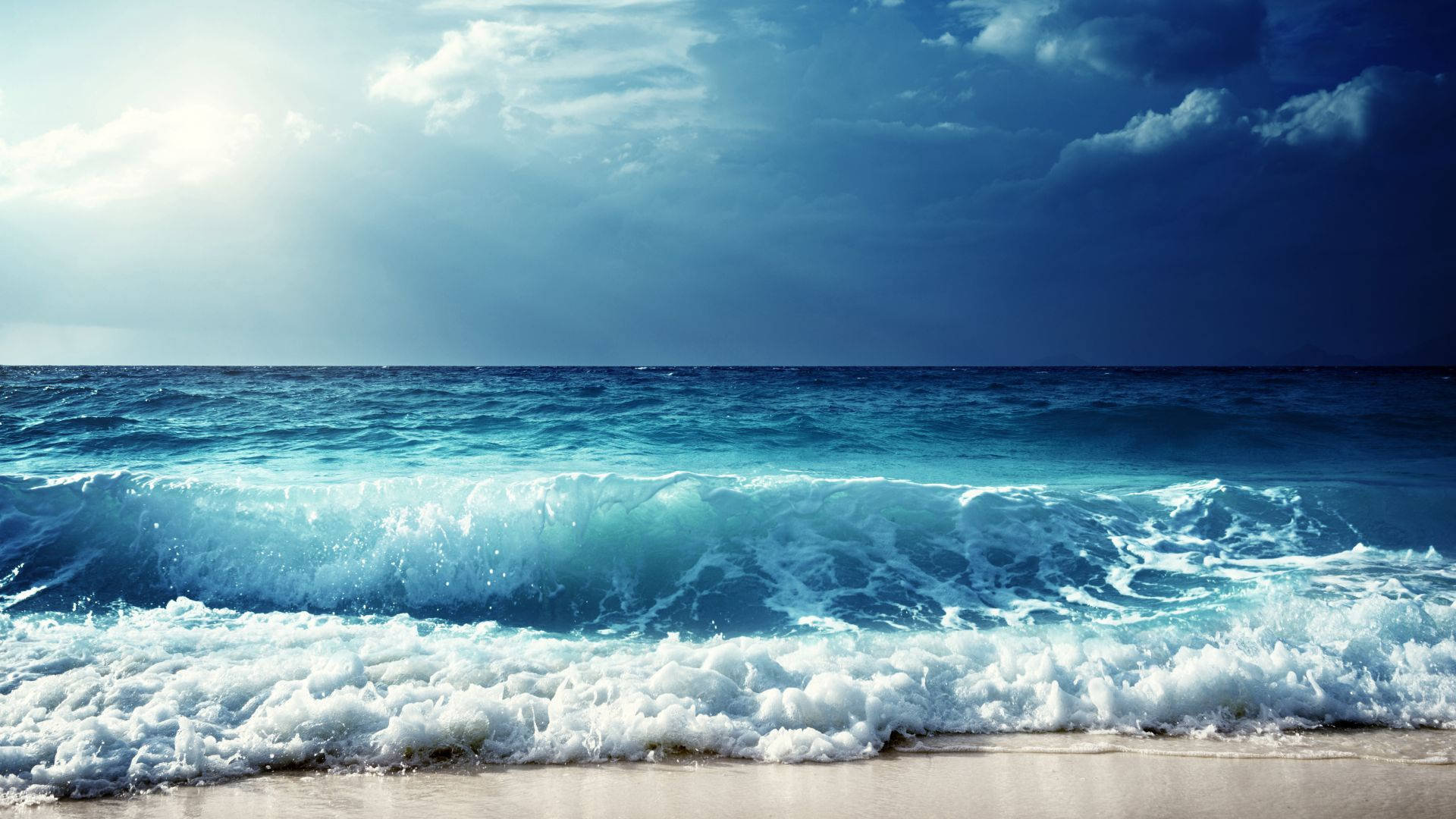 turquoise ocean waves, sandy shore, dramatic cloudy sky, Full HD Desktop Wallpaper