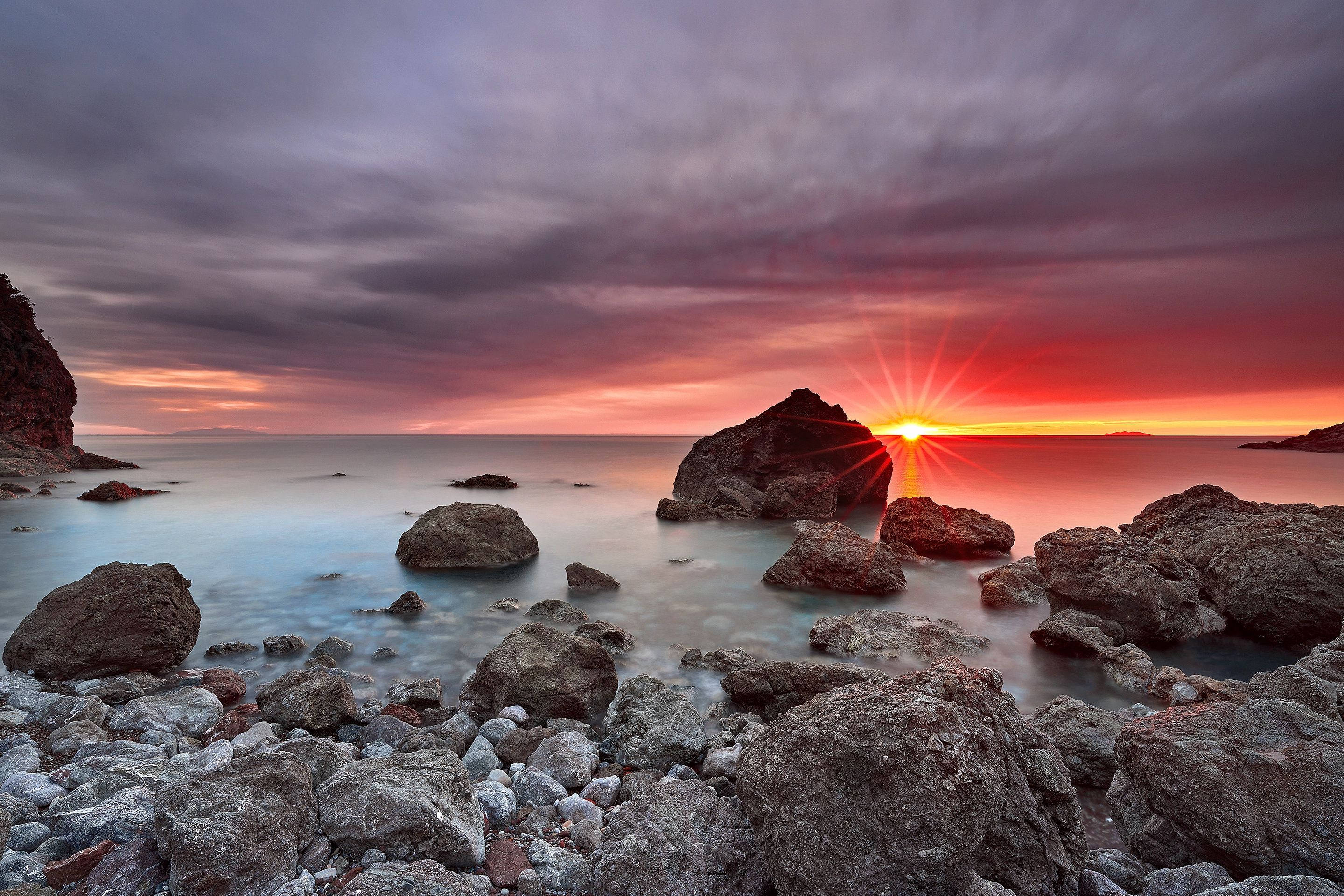 sunset, rocky coastline, red and orange skies, 2K Desktop Wallpaper