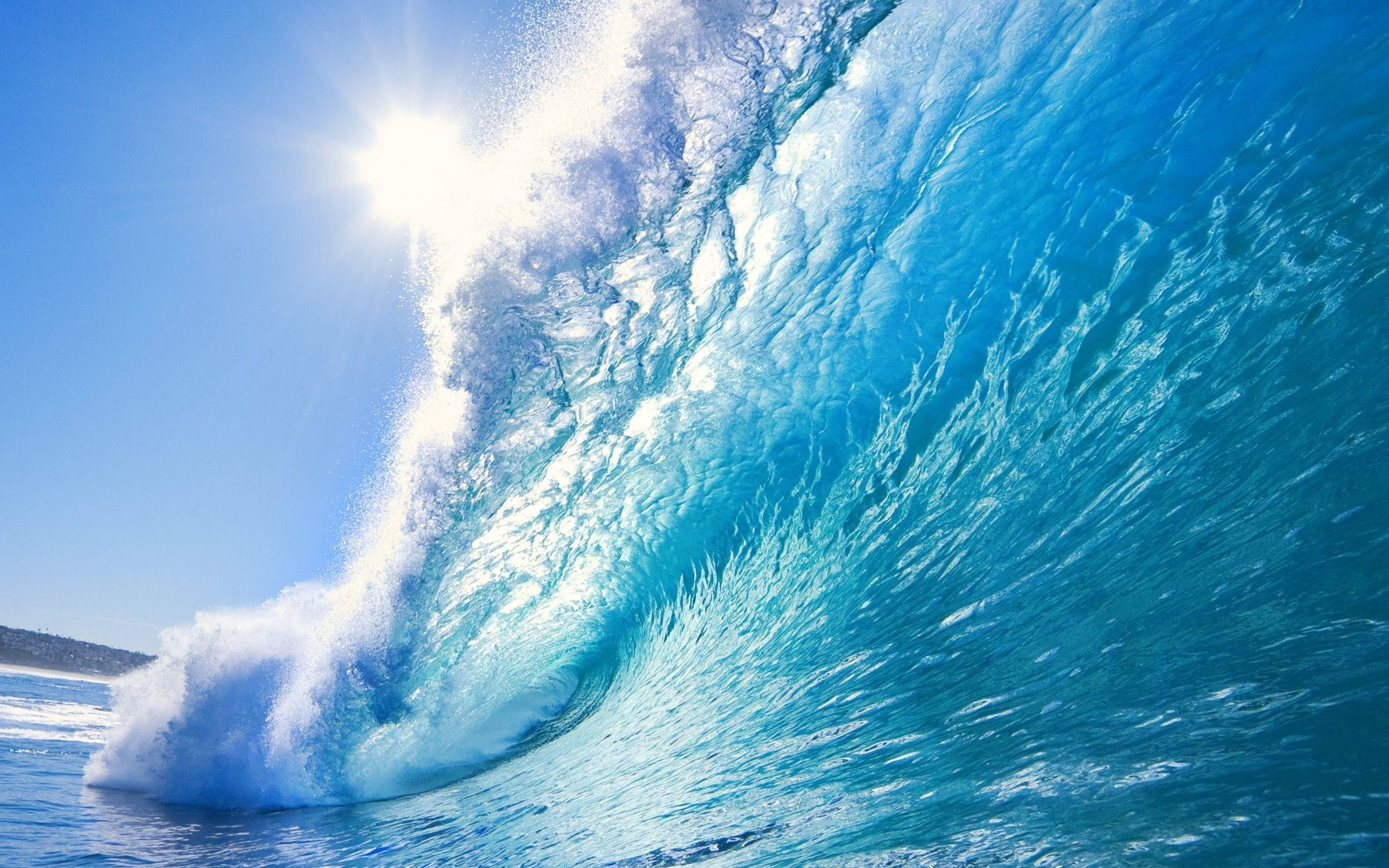 turquoise ocean wave, blazing sun, sparkling spray, 2K Desktop Wallpaper