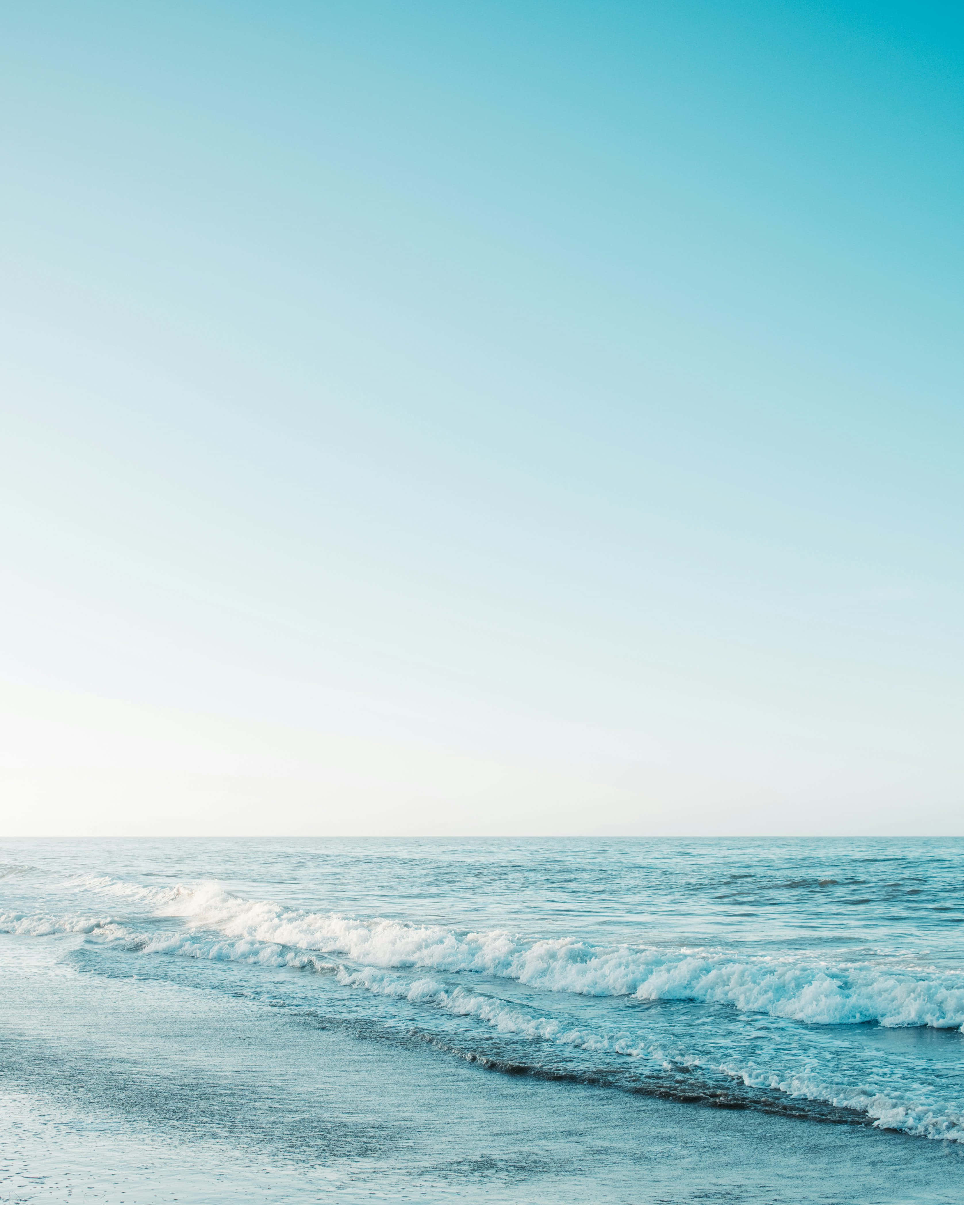 serene blue beach waves, turquoise waves, wet sandy shore, 4K Phone Wallpaper