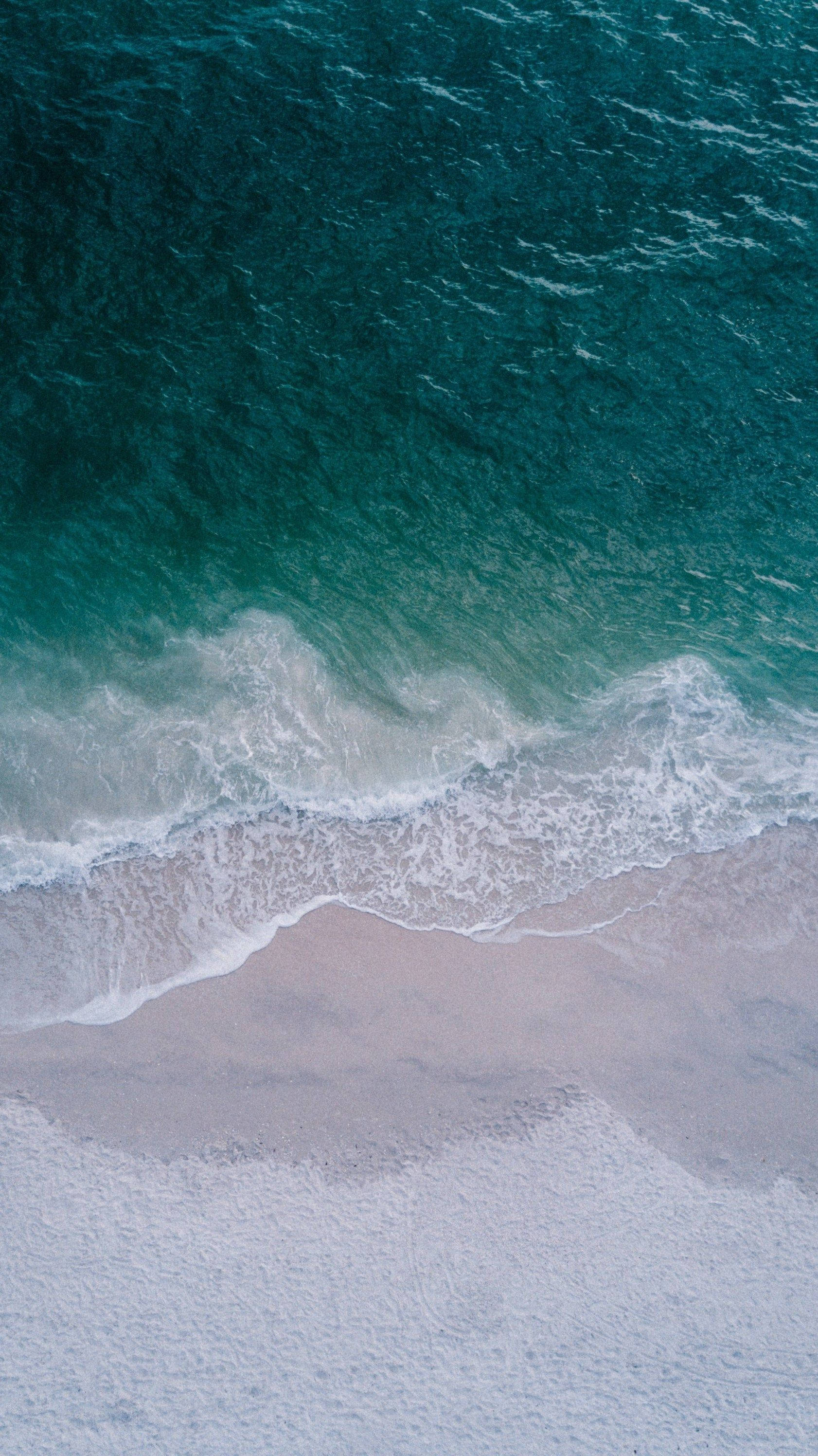 iPhone XS, turquoise ocean, pale pink sandy beach, 2K Phone Wallpaper