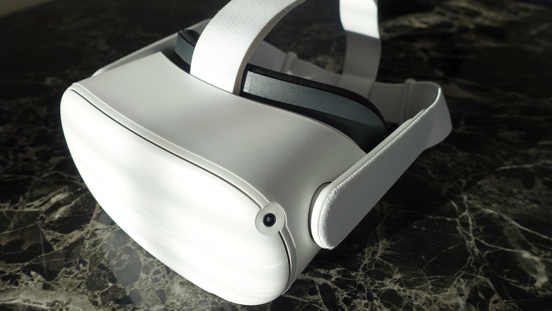 Oculus Quest 2, sleek white VR headset, dark veined marble surface, Full HD Desktop Wallpaper