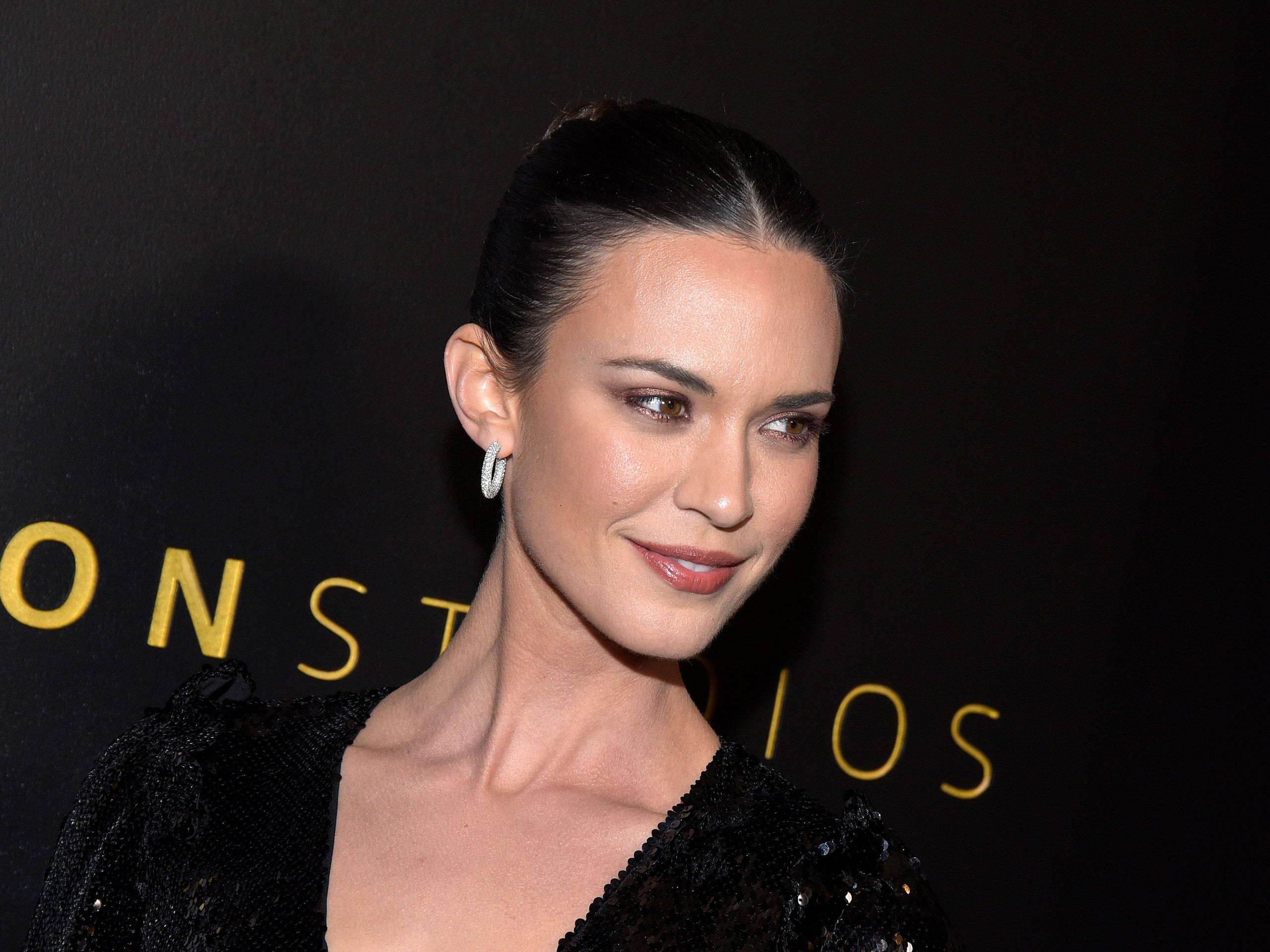Odette Annable, elegant black dress, sleek dark hair, 2K Desktop Wallpaper