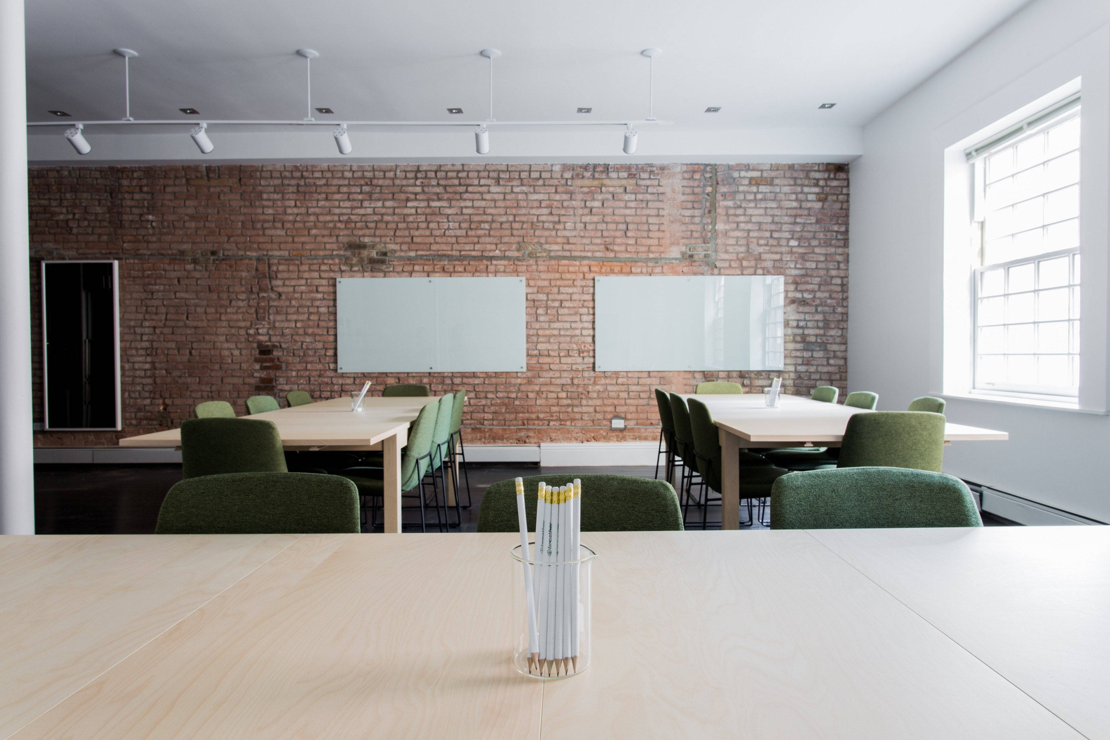 Zoom background, modern minimalist office, exposed brick walls, 4K Desktop Wallpaper