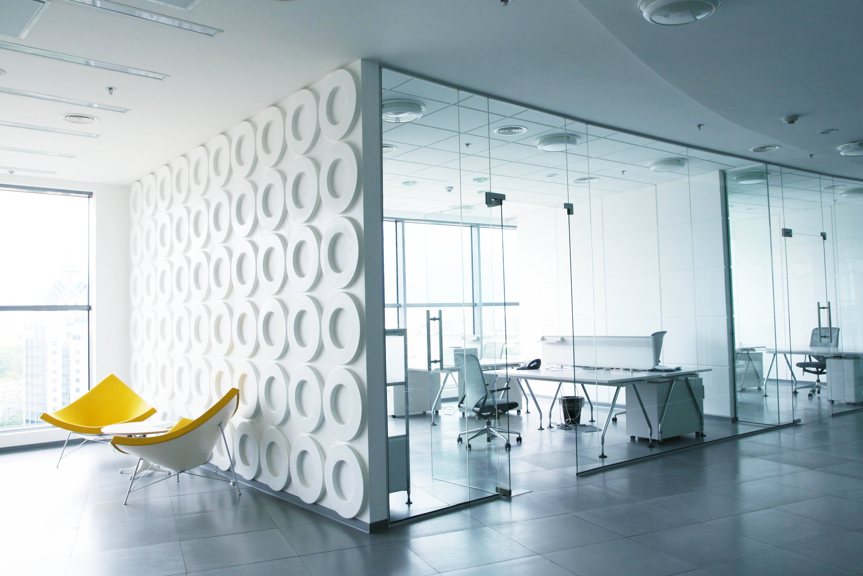 The Office, glass-walled meeting rooms, bold yellow chairs, 2K Desktop Wallpaper