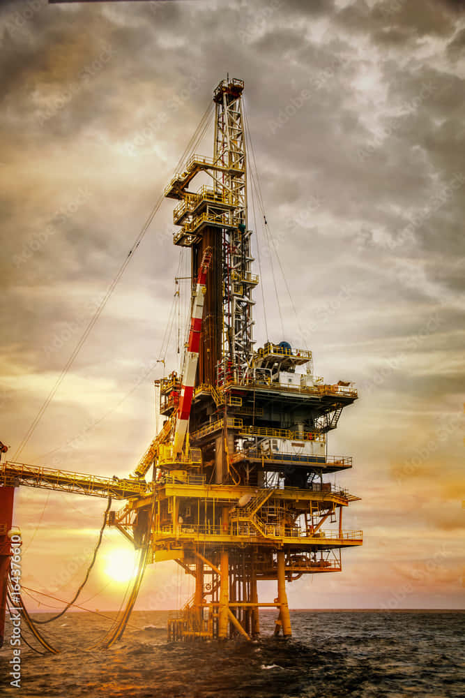 offshore oil rig platform, sunset, golden light, SD Phone Wallpaper