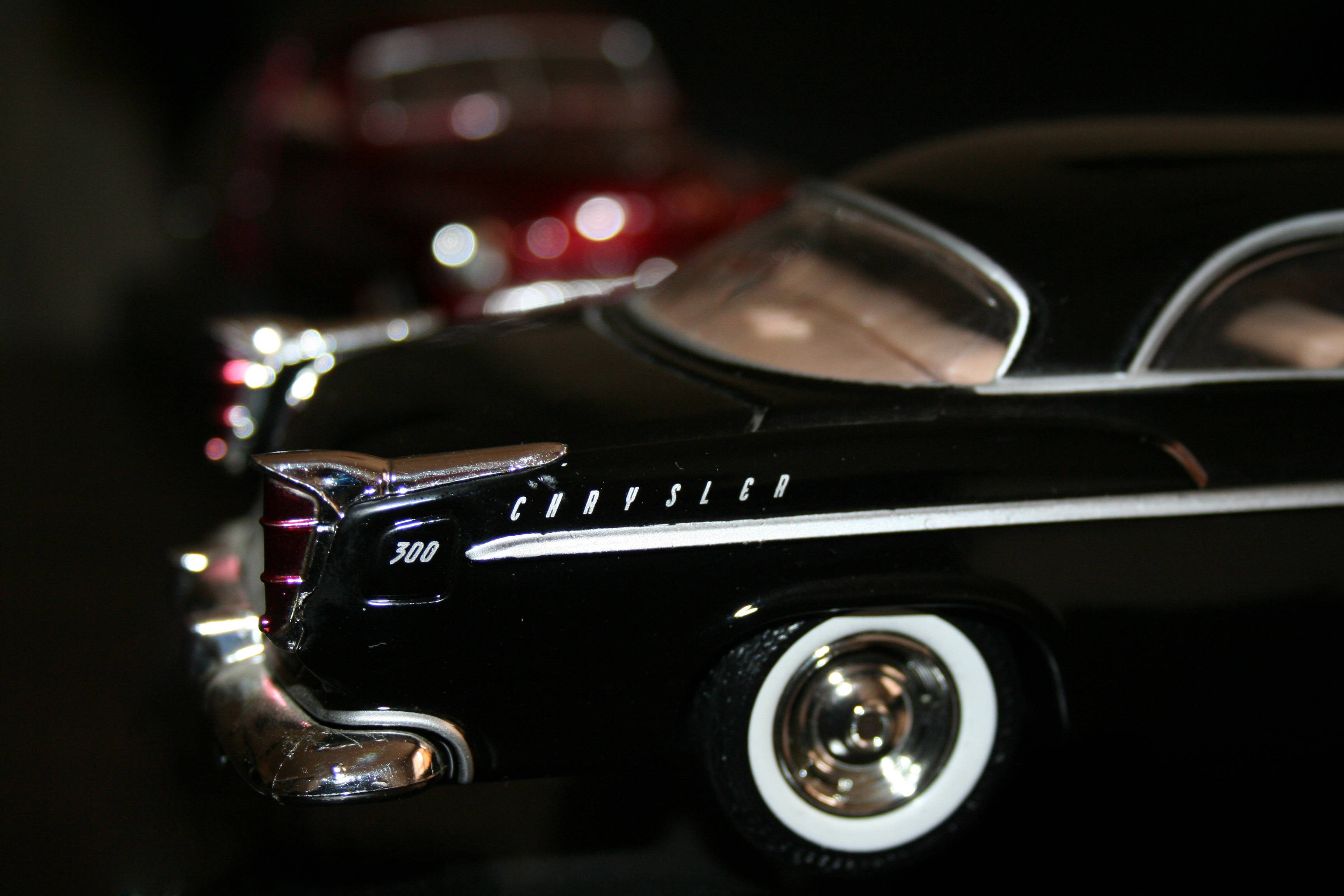 1950s Chrysler 300, glossy black, chrome accents, 2K Desktop Wallpaper
