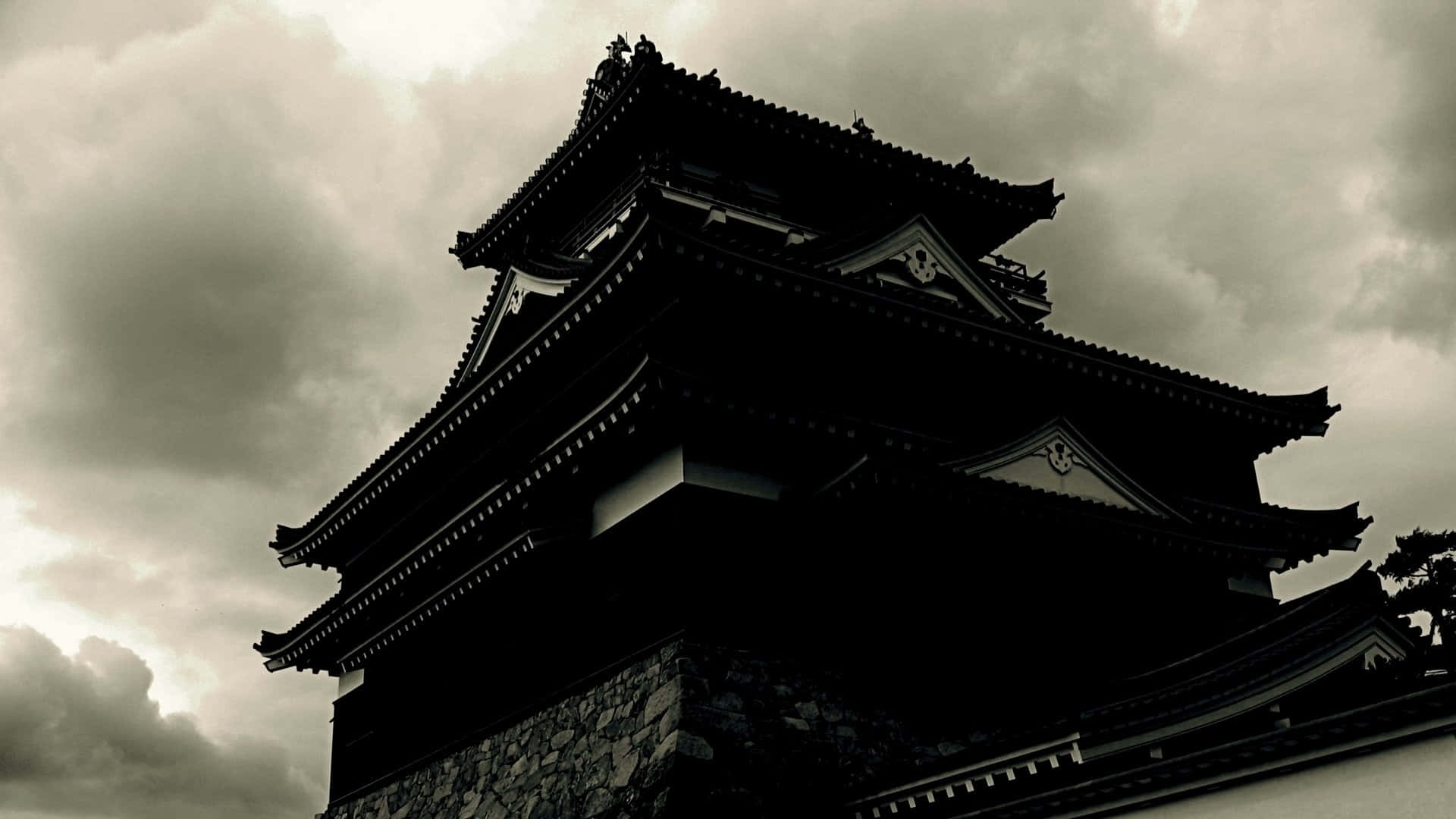 traditional Japanese castle tower, stormy gray sky, low-angle shot, Full HD Desktop Wallpaper