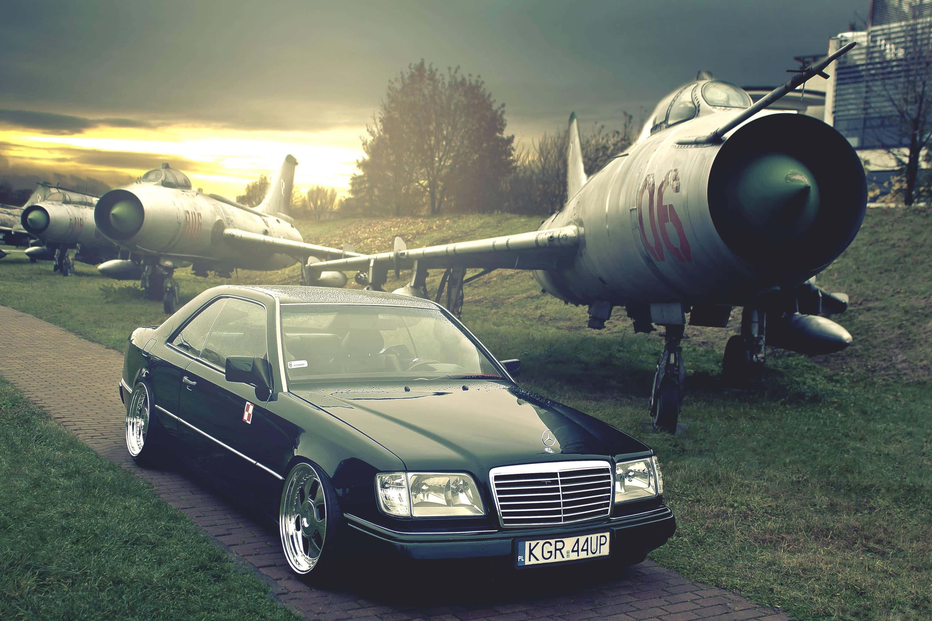 Mercedes coupe, vintage military jets, golden sunset sky, 2K Desktop Wallpaper