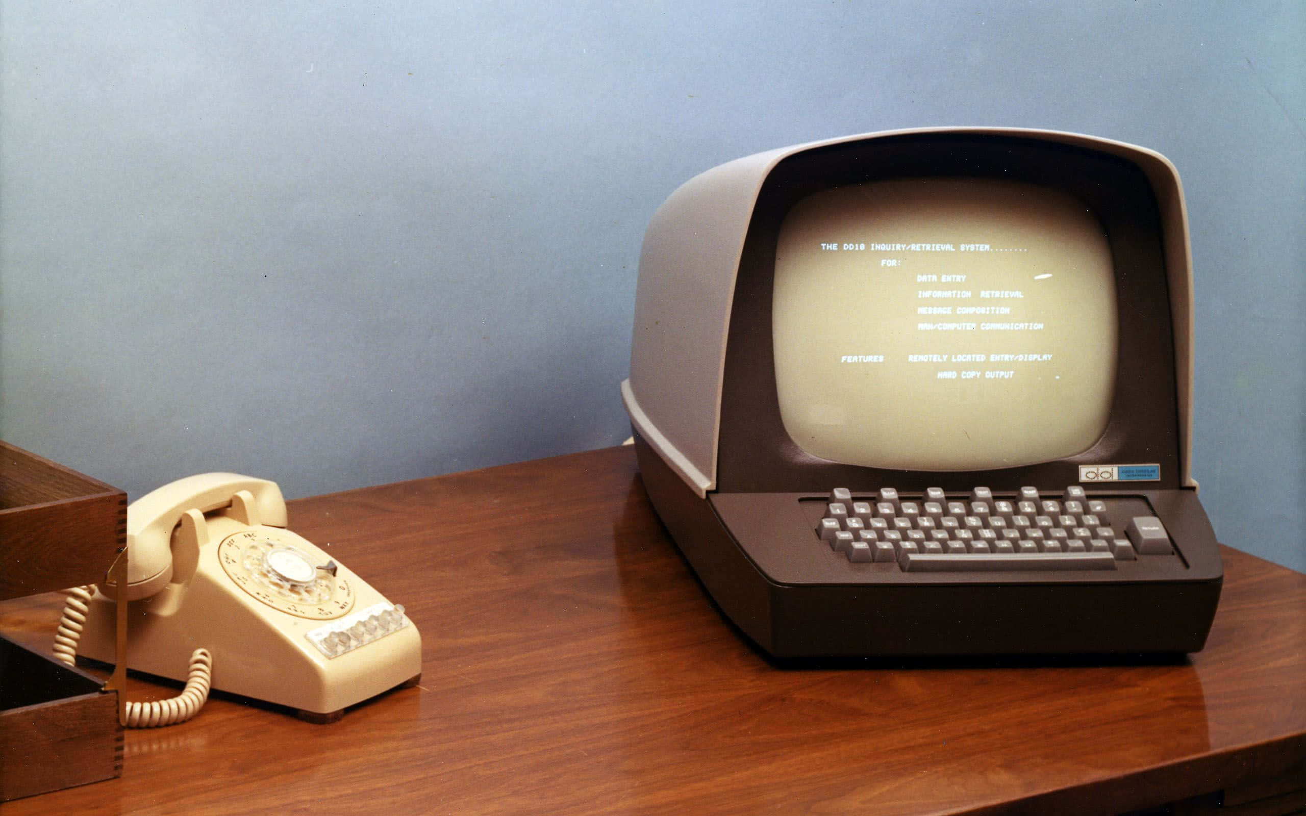 brown wooden desk, vintage beige rotary phone, retro computer, 2K Desktop Wallpaper