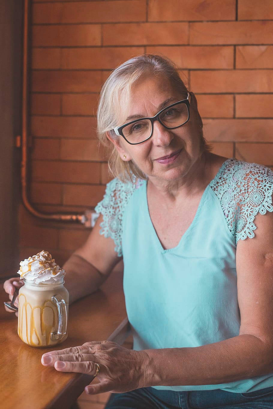 older woman, glasses, wooden table, HD Phone Wallpaper