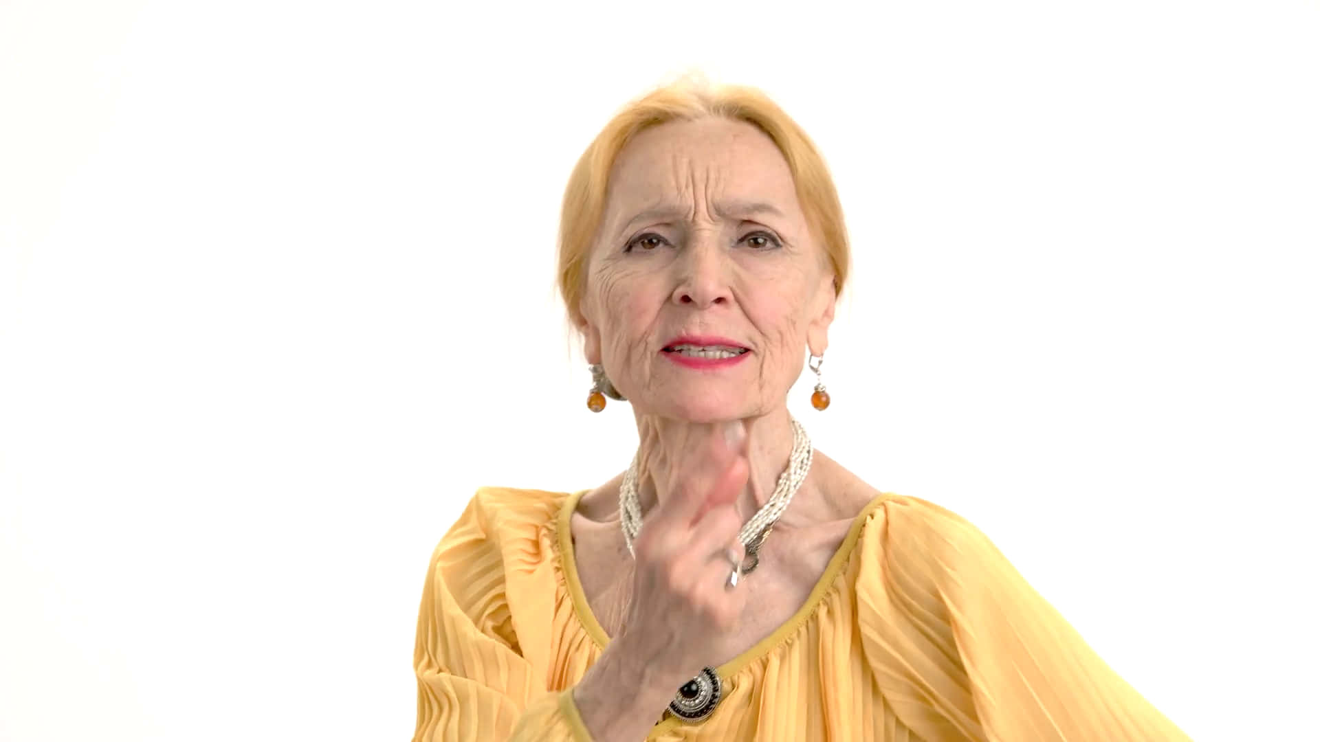 Irritated Well-groomed Old Lady, blonde hair, yellow dress, Full HD Desktop Wallpaper