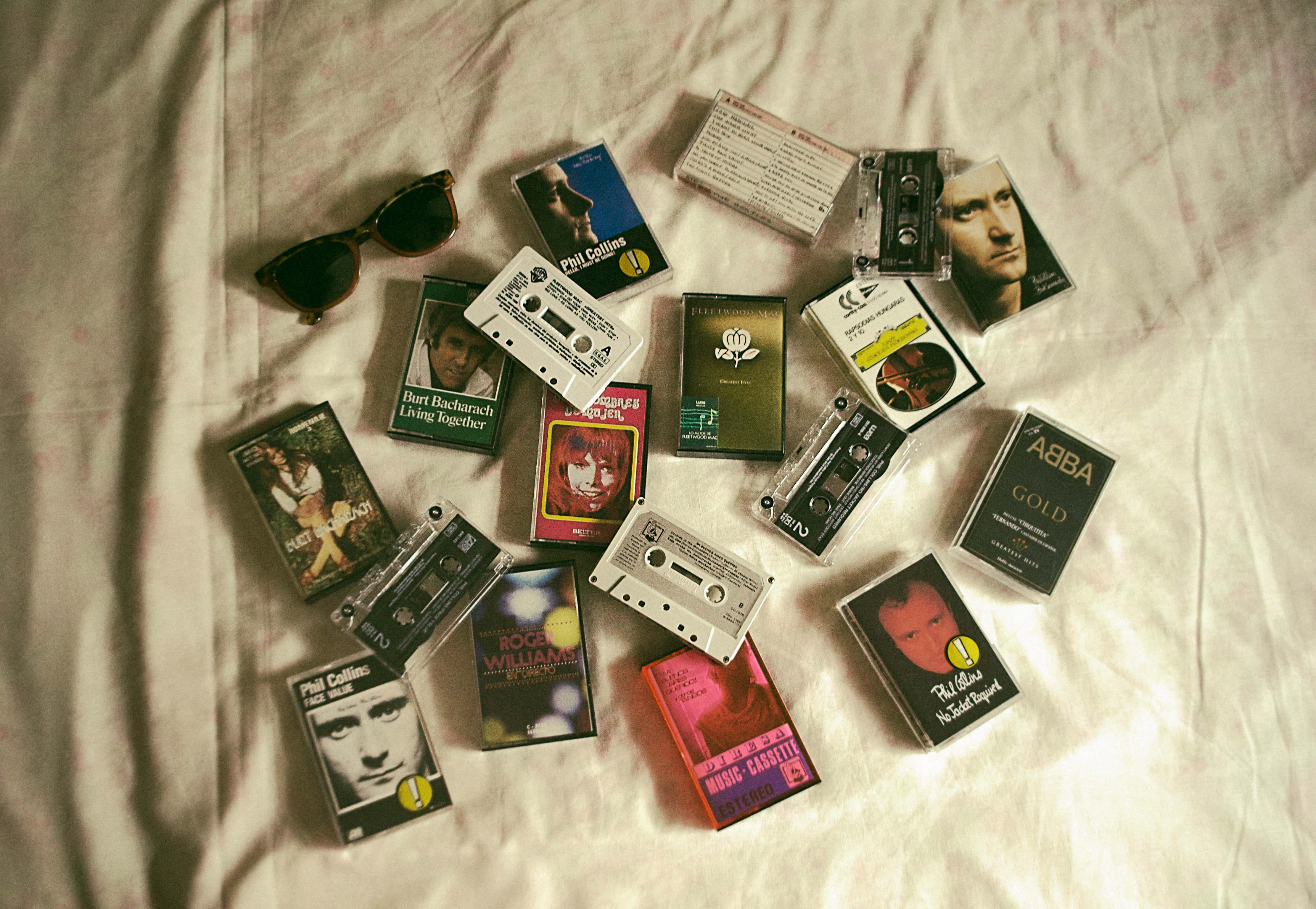 vintage music cassette collection, sunglasses, wrinkled white sheet, 4K Desktop Wallpaper