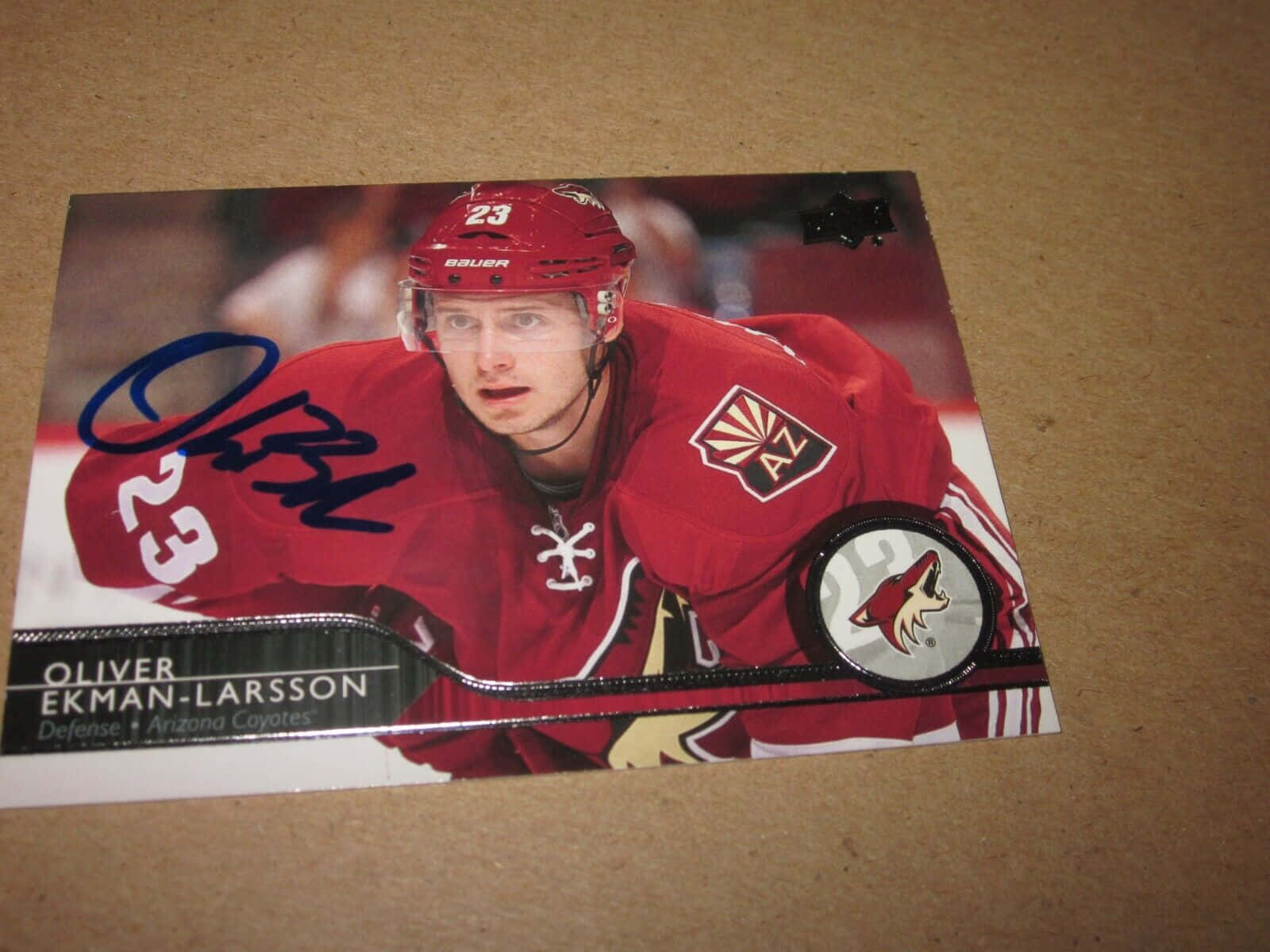 Oliver Ekman-Larsson, red Arizona Coyotes jersey, brown surface, HD Desktop Wallpaper