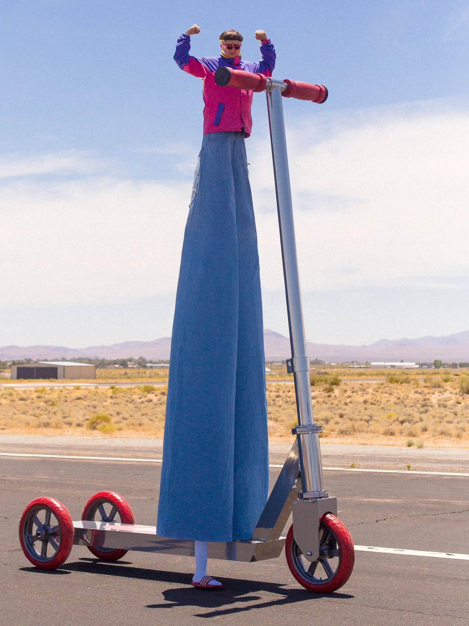 Oliver Tree, gigantic scooter, desert parking lot, Full HD Phone Wallpaper