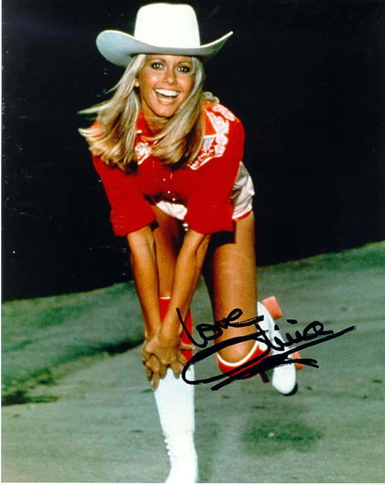 Olivia Newton John, red cowboy outfit, white hat, SD Phone Wallpaper