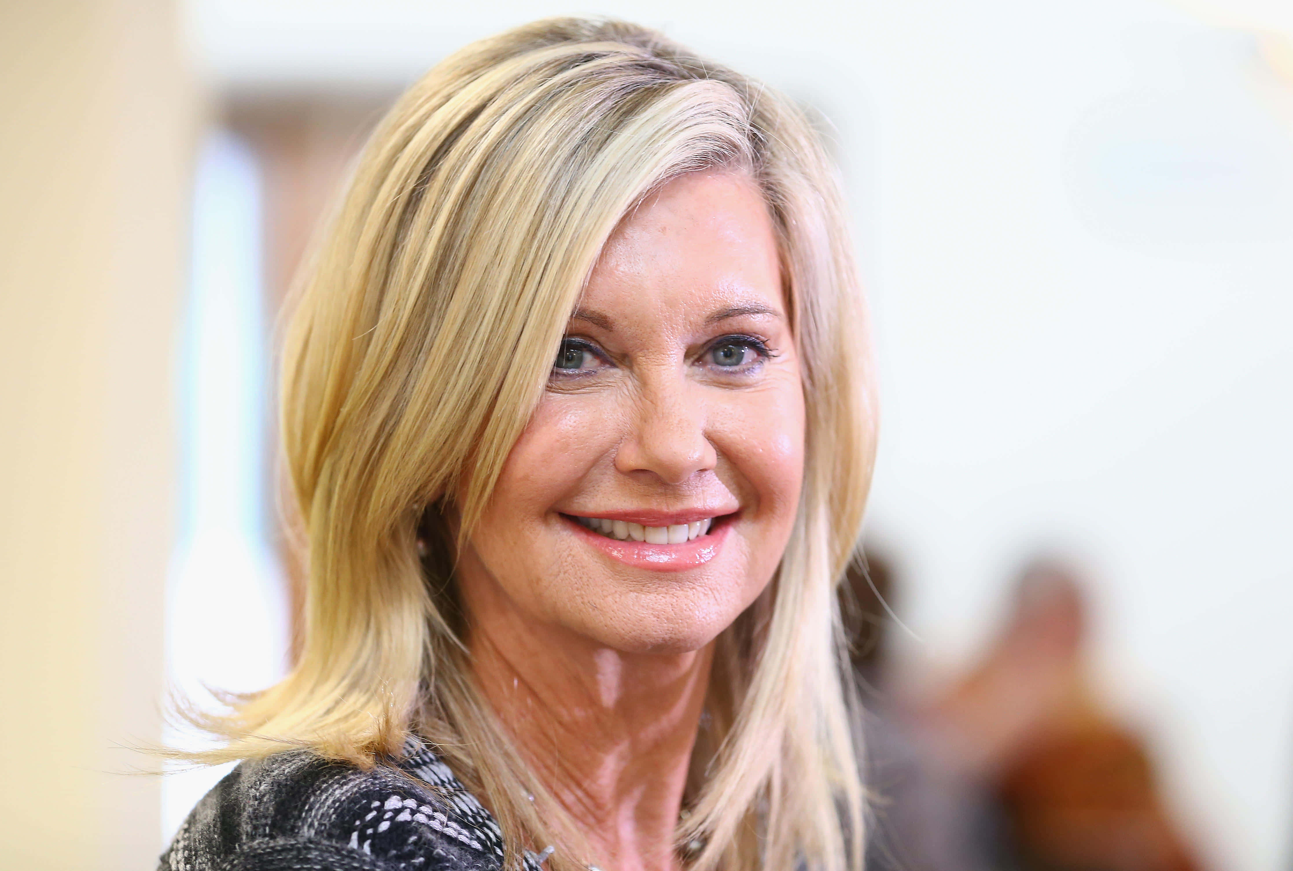 Olivia Newton-John, blonde woman, blue eyes, 4K Desktop Wallpaper