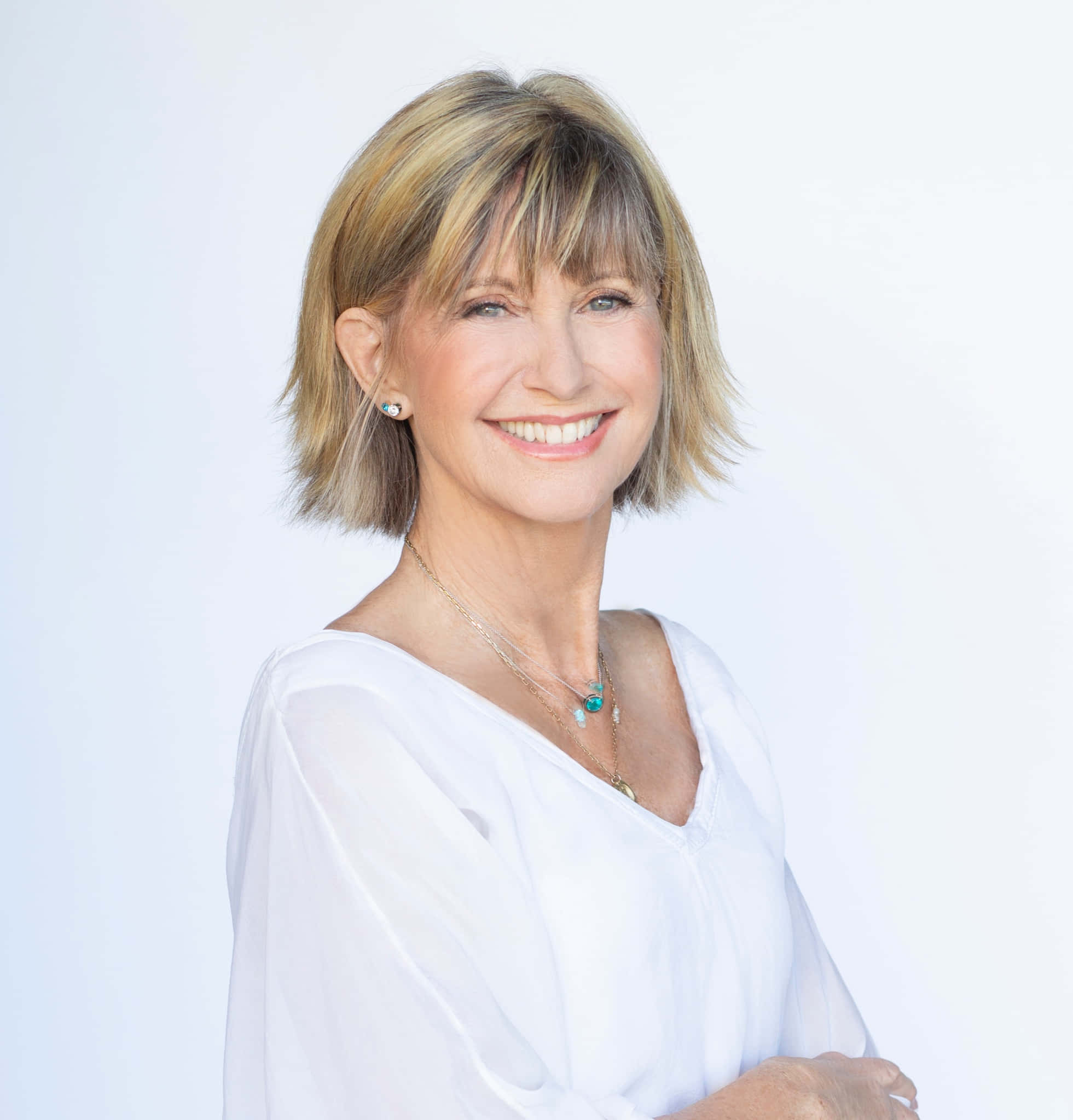 Olivia Newton John, blonde bob hair, crisp white blouse, Full HD Phone Wallpaper