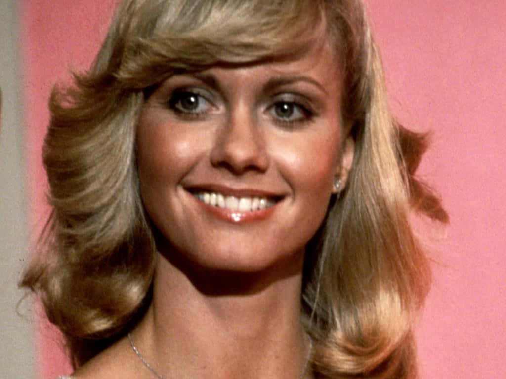 Olivia Newton John, voluminous blonde hair, bright eyes, SD Desktop Wallpaper