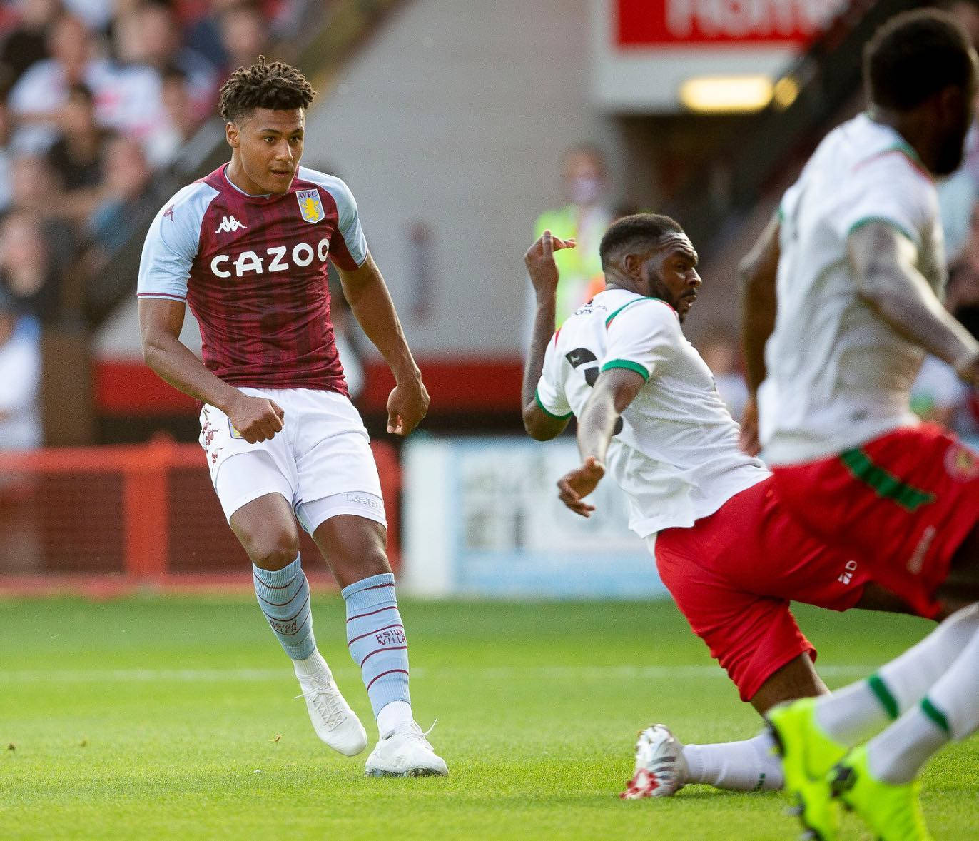 Ollie Watkins, maroon and light blue jersey, vibrant green pitch, HD Desktop Wallpaper