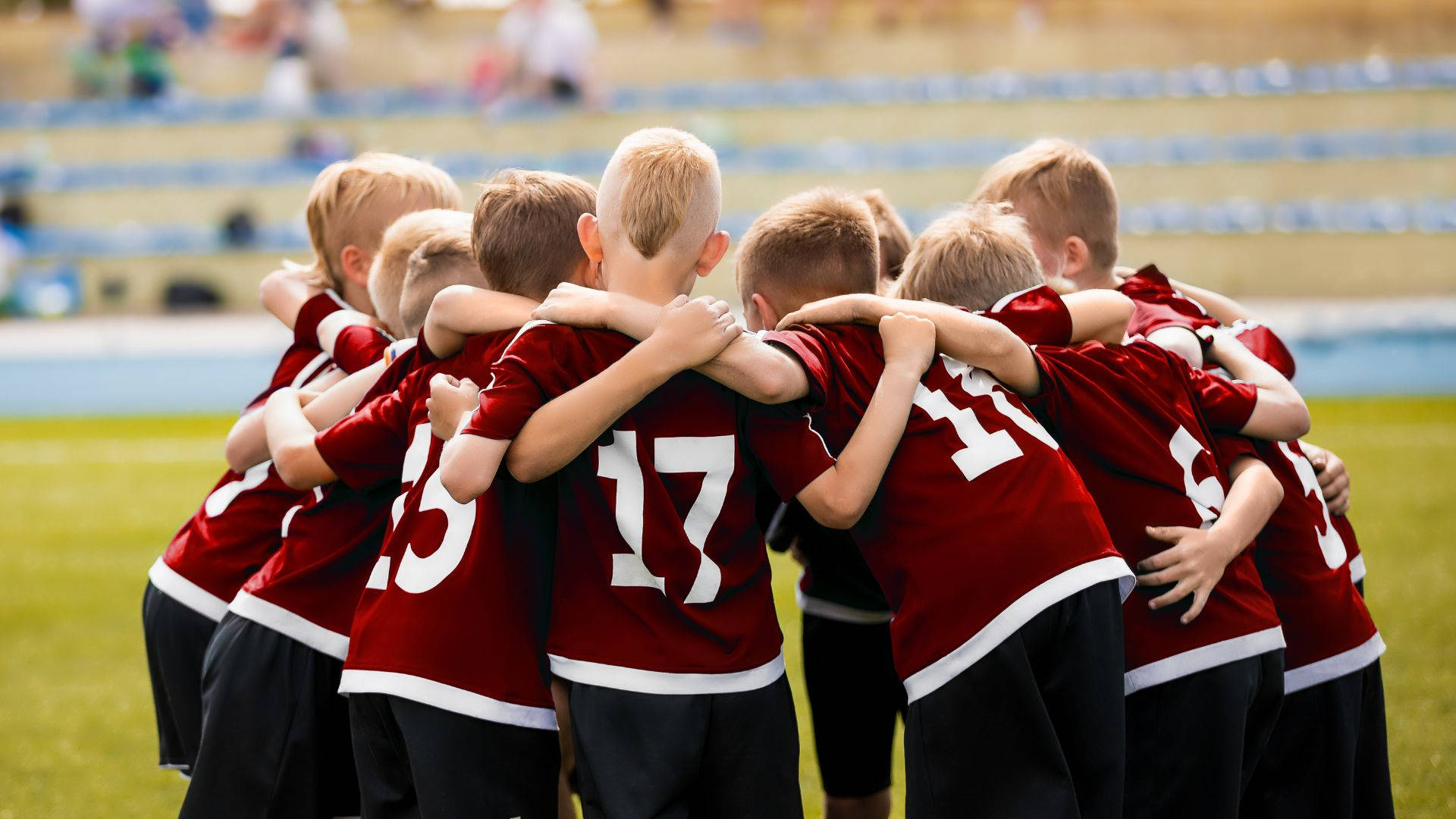 kids playing olympic sport soccer, red jerseys, grassy field, Full HD Desktop Wallpaper
