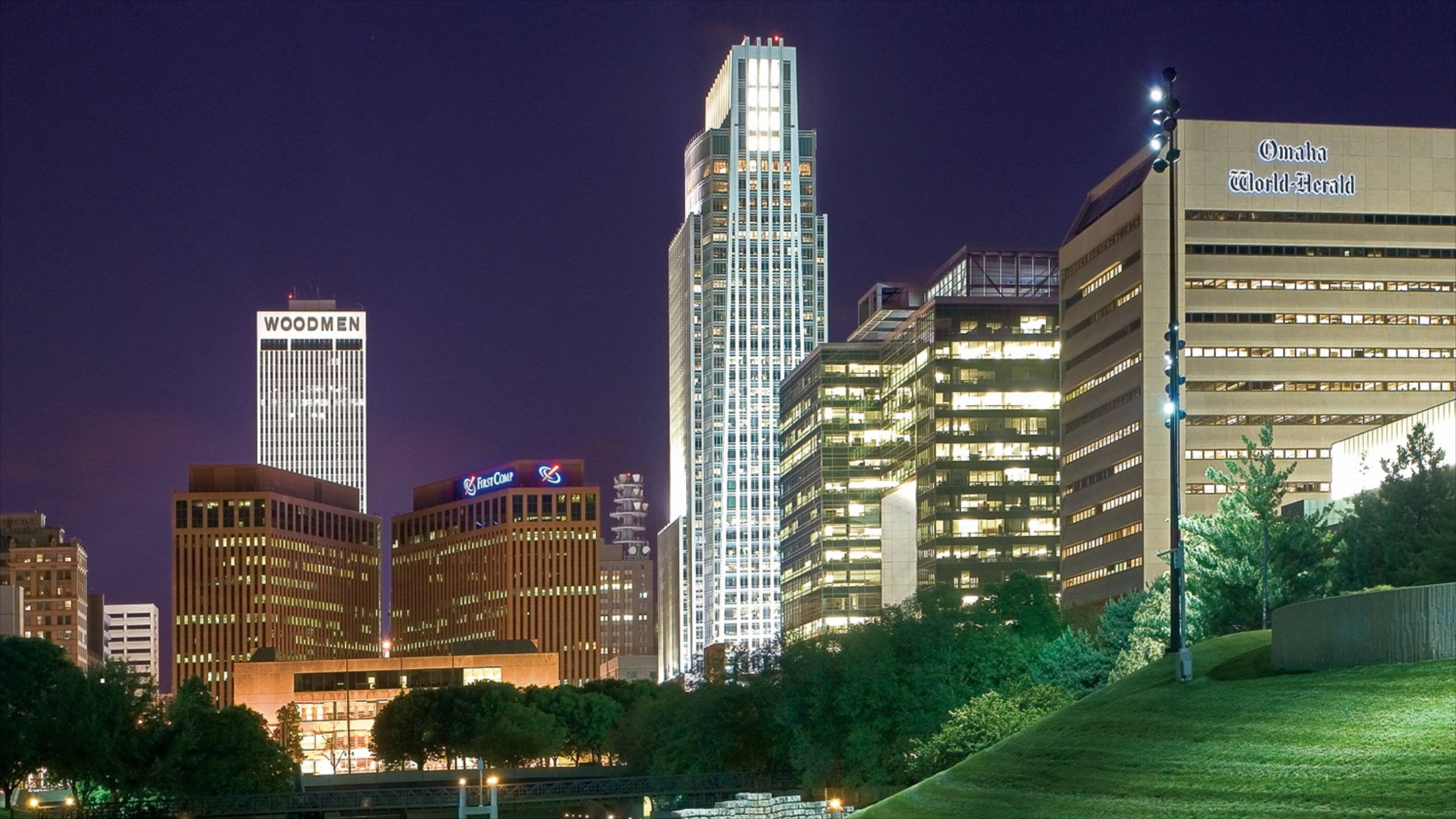 Omaha, nighttime cityscape, illuminated skyscrapers, 2K Desktop Wallpaper