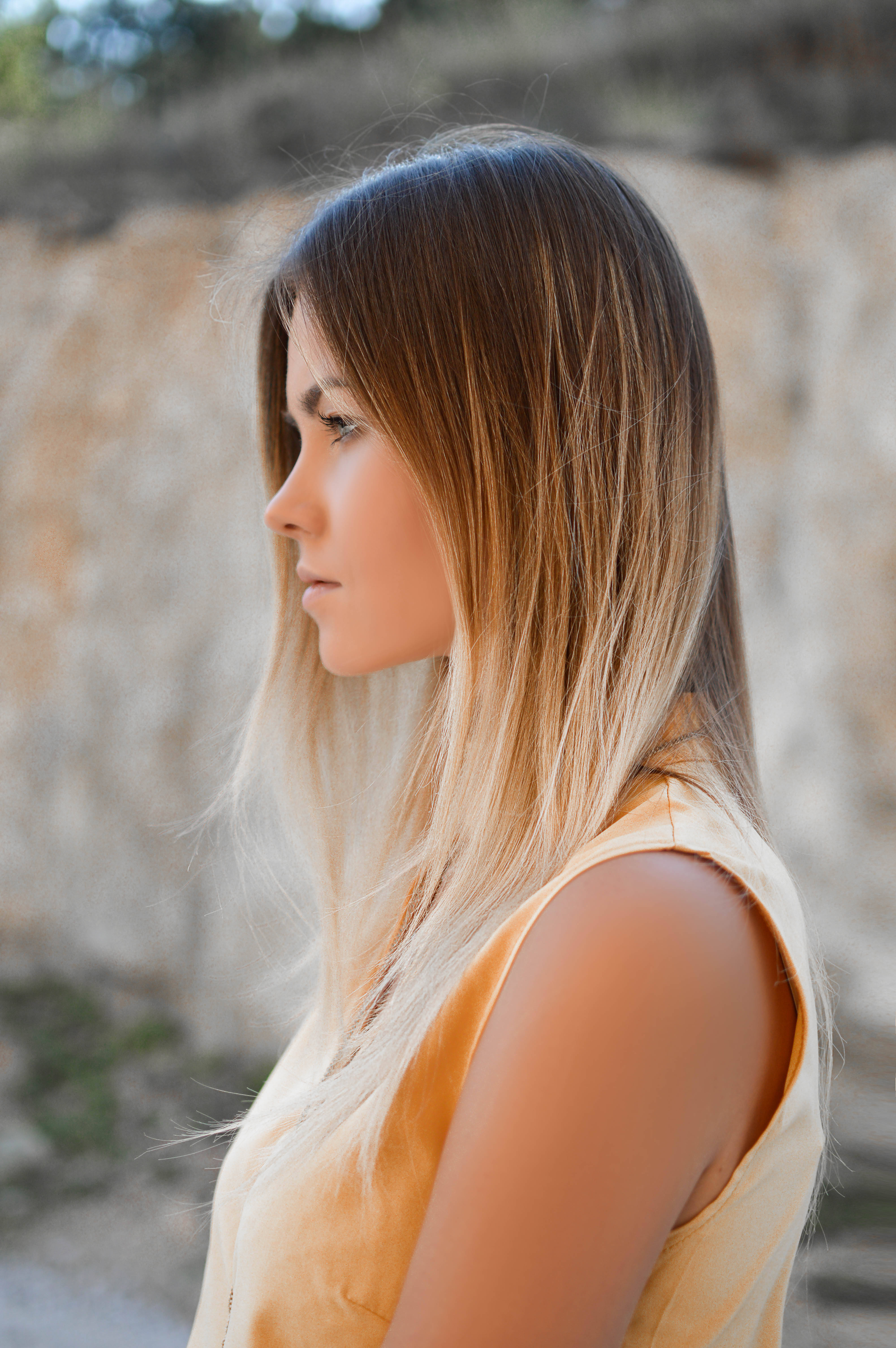 ombre haired woman, long ombre hair, sunlit rocky cliff, 5K Phone Wallpaper