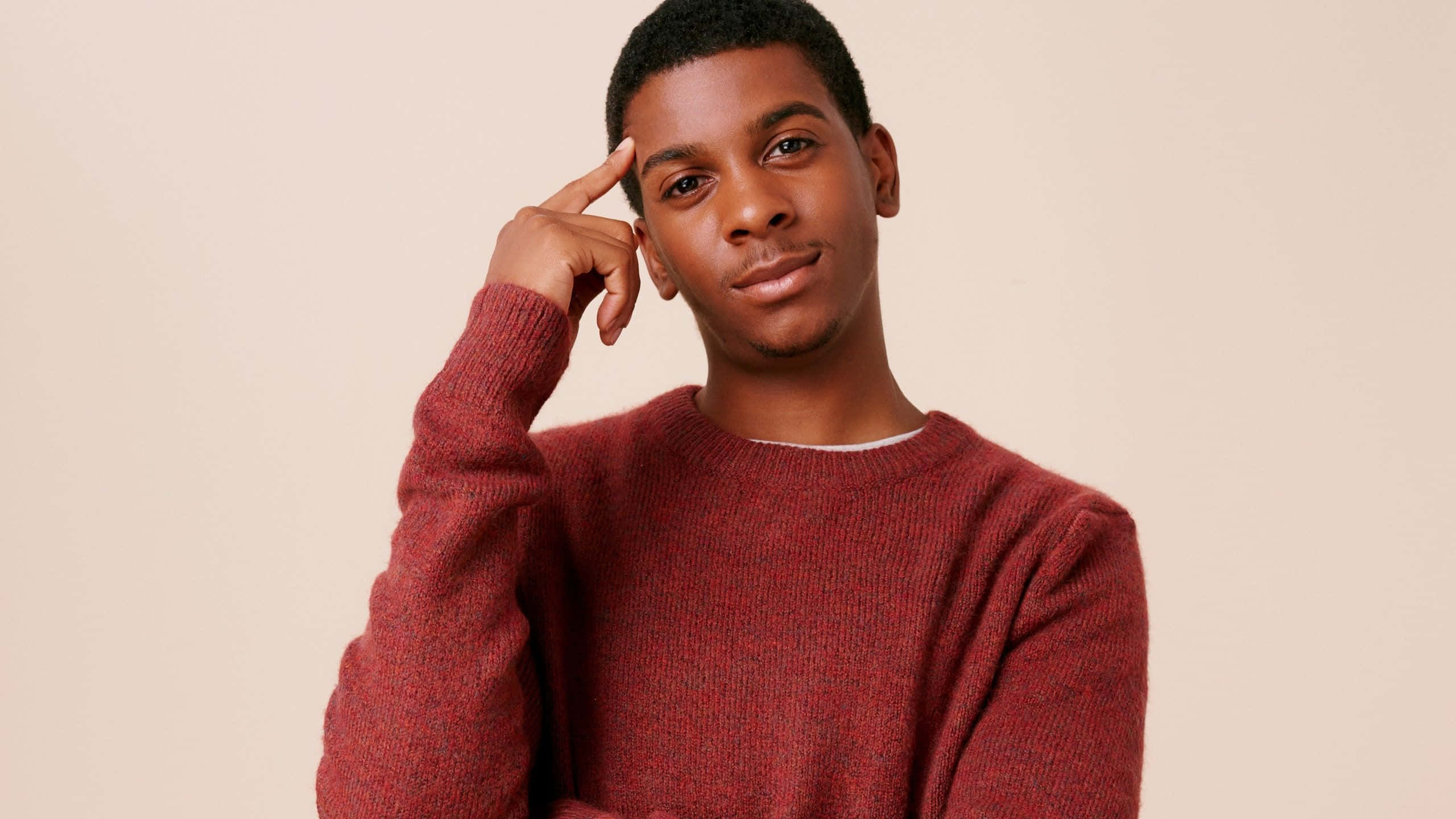 On My Block, red sweater, finger on temple, 2K Desktop Wallpaper