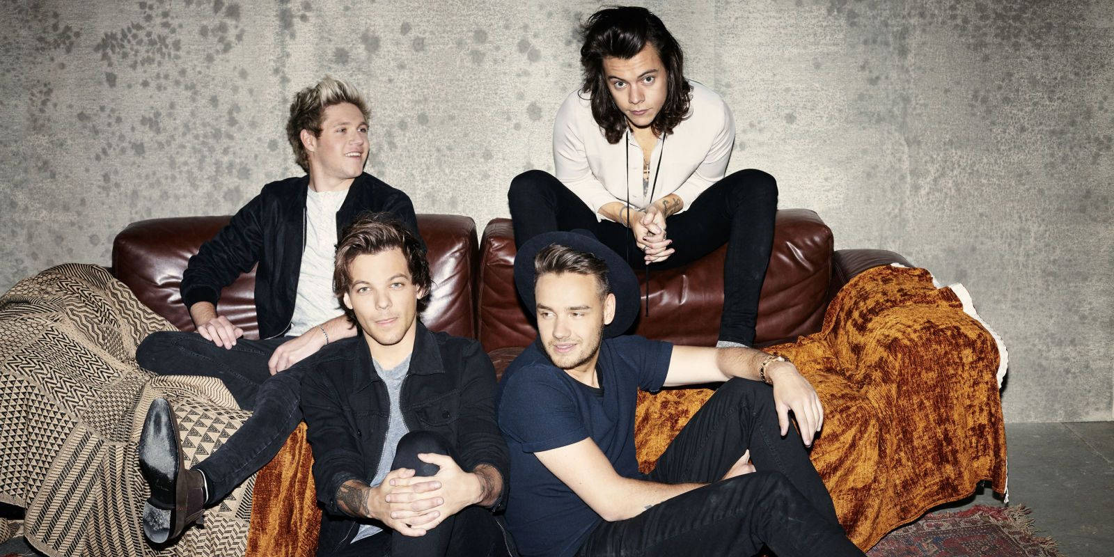 One Direction, brown leather couch, patterned blankets, HD Desktop Wallpaper