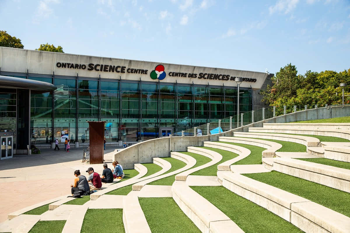 Ontario Science Centre, curved grassy steps, modern glass facade, SD Desktop Wallpaper