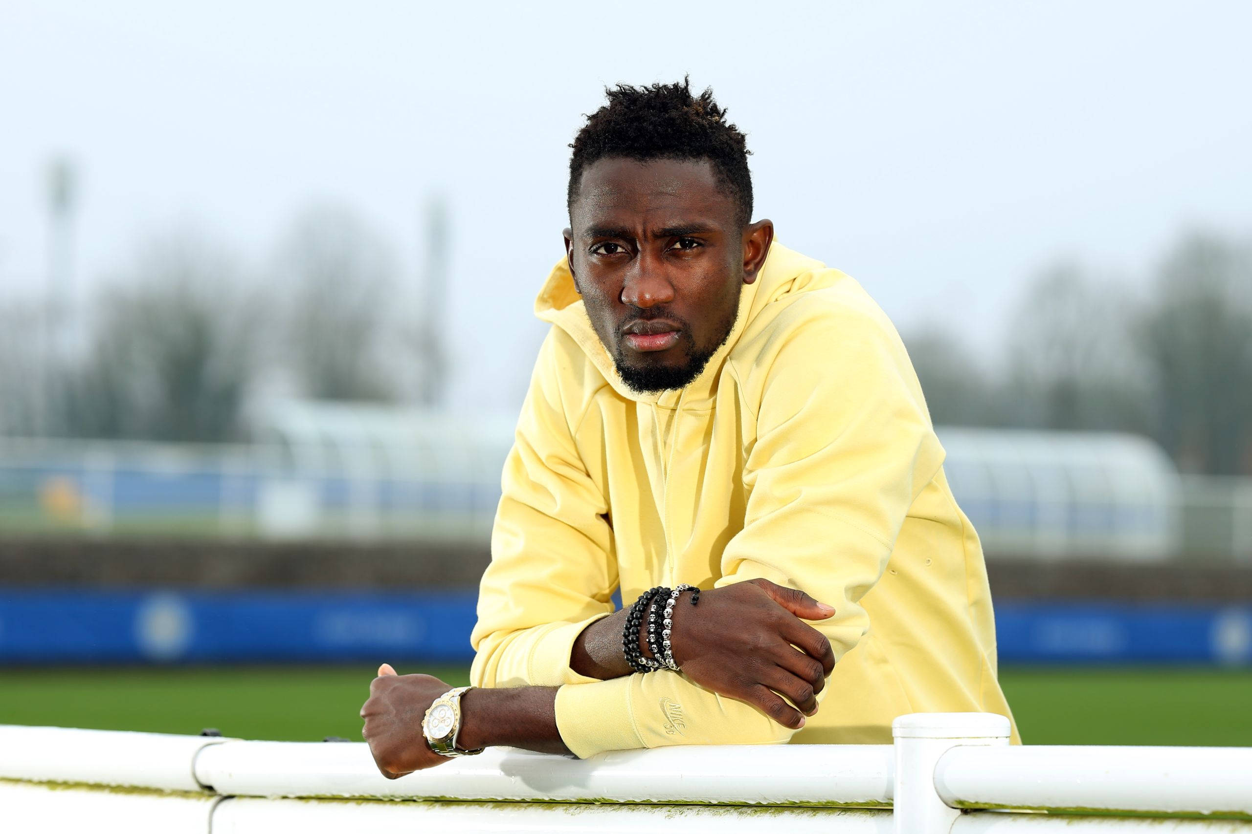 Onyinye Ndidi, yellow hoodie, white railing, 2K Desktop Wallpaper