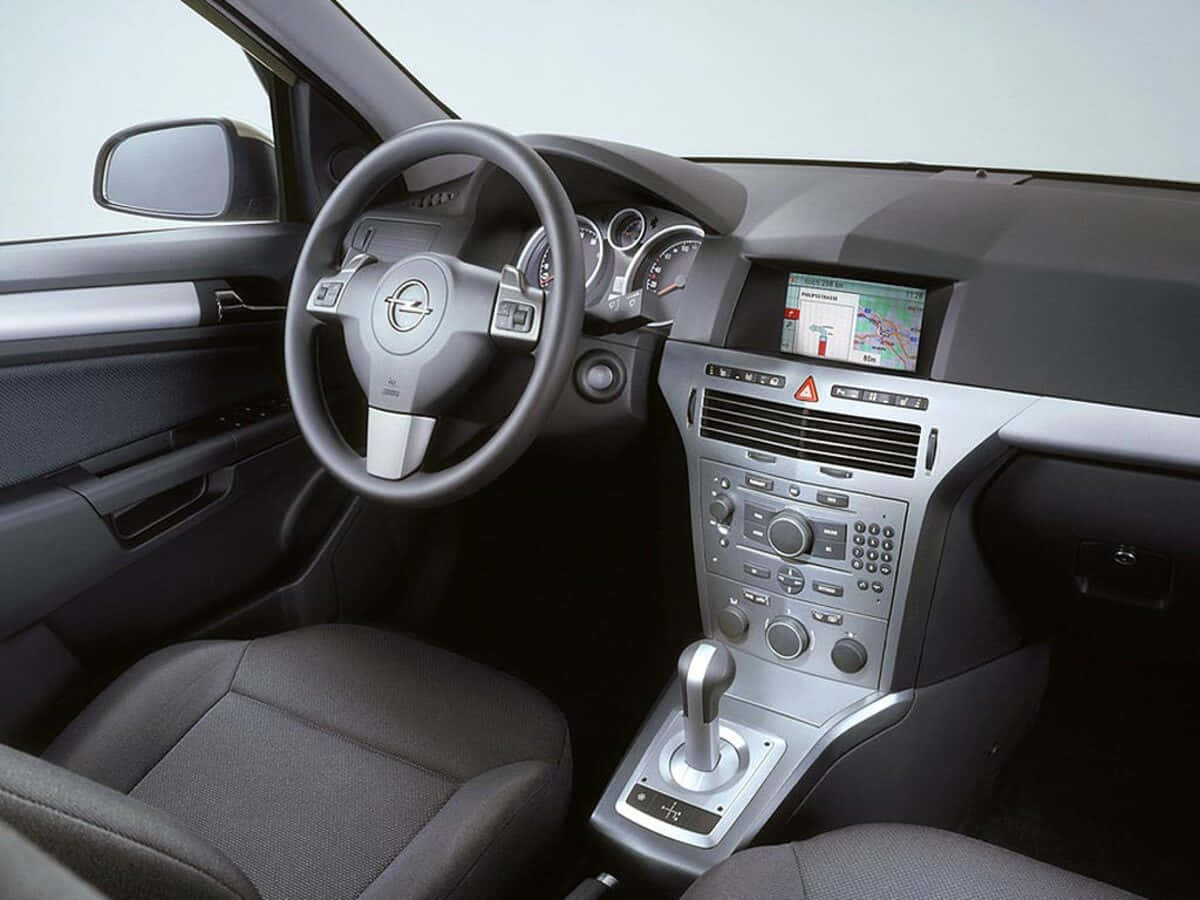 Opel Astra, sleek dashboard, silver accents, SD Desktop Wallpaper
