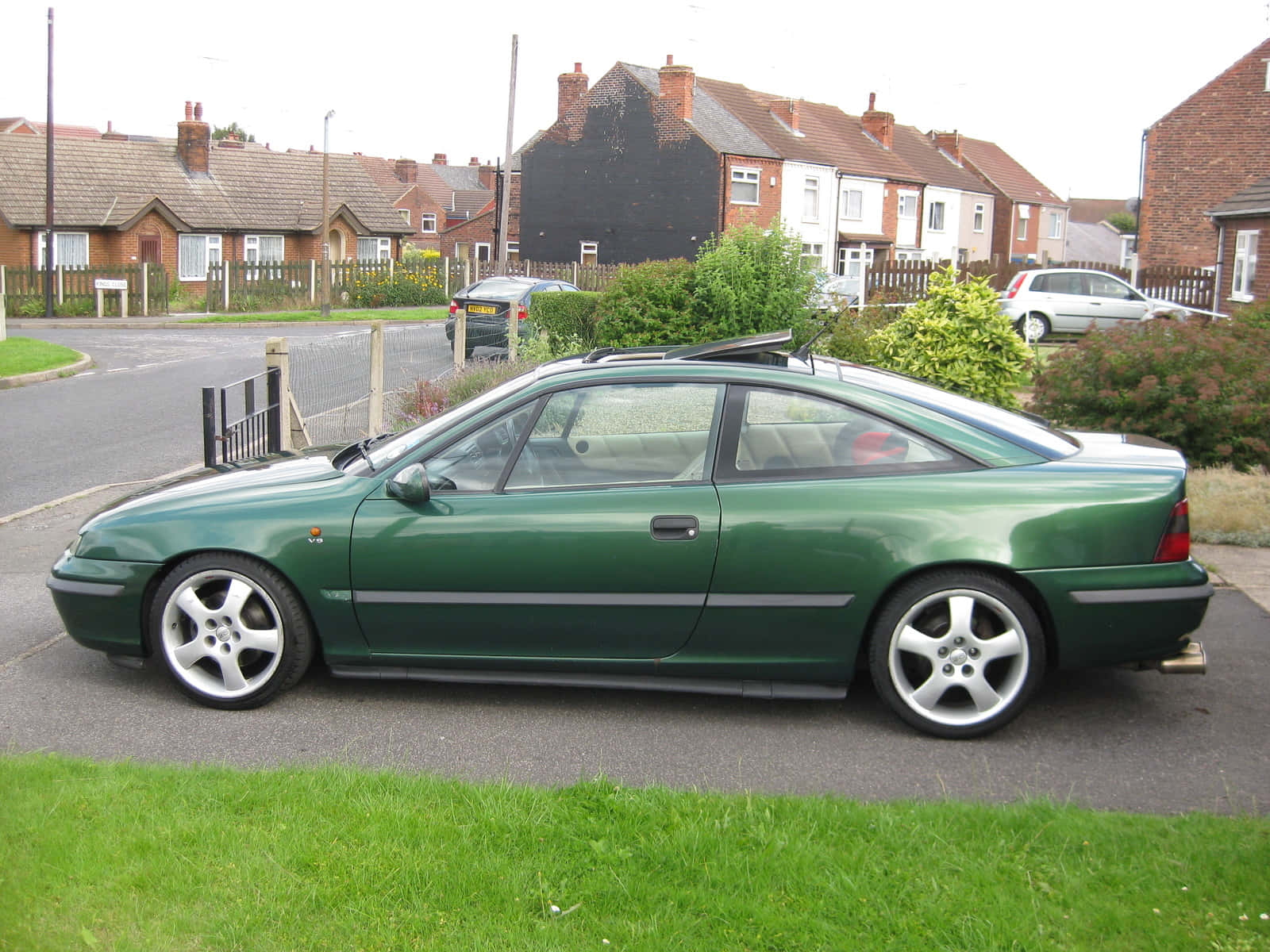 Opel Calibra, green coupe, residential street, HD Desktop Wallpaper