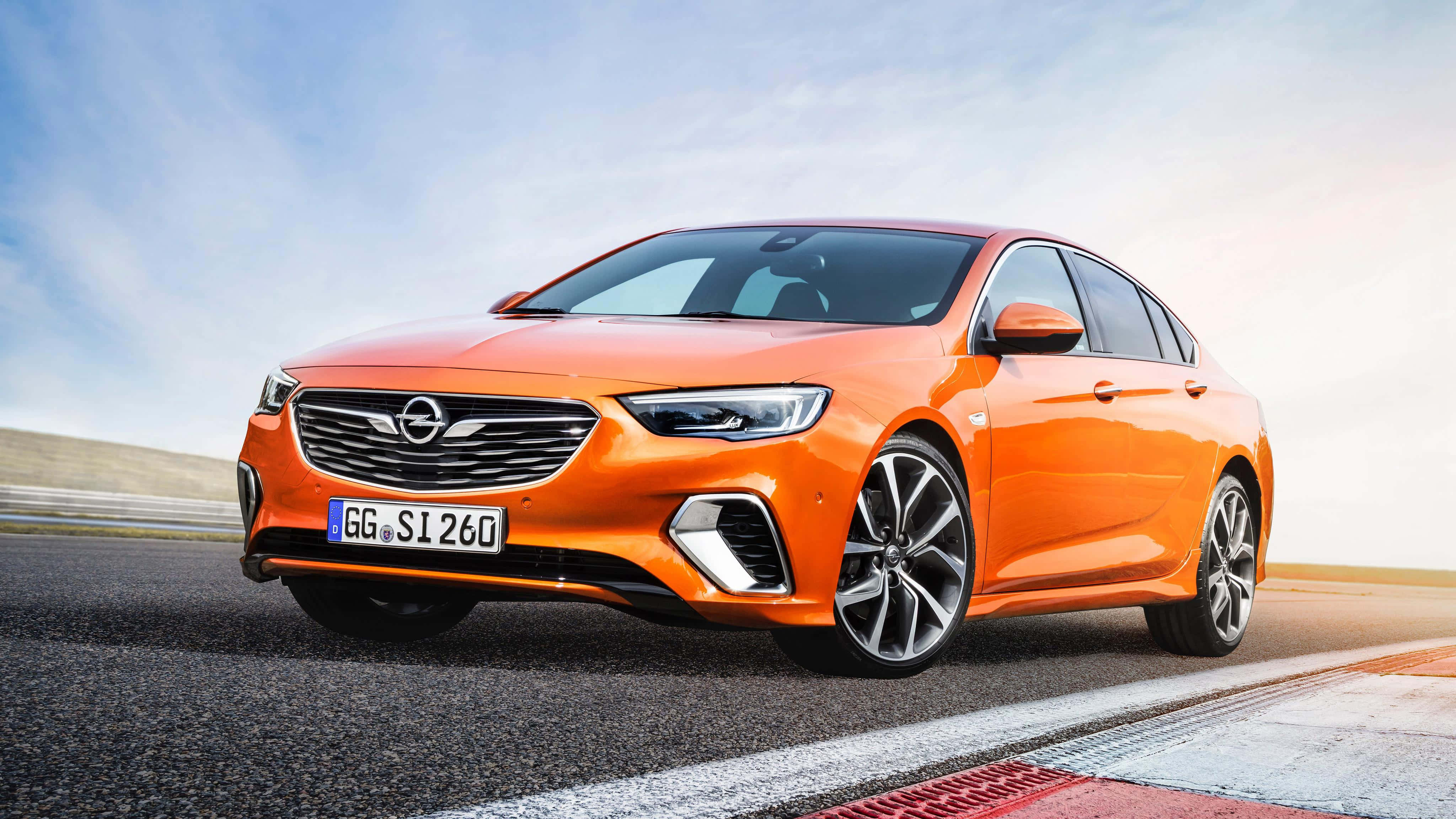 Opel Insignia, vibrant orange, racetrack, 4K Desktop Wallpaper