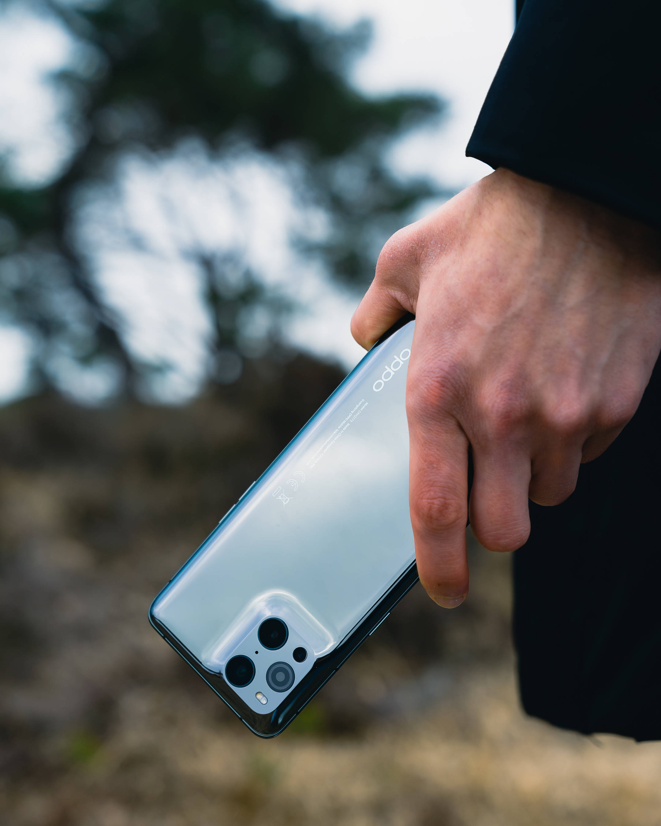 OPPO smartphone, quad-camera setup, sleek silver, 2K Phone Wallpaper