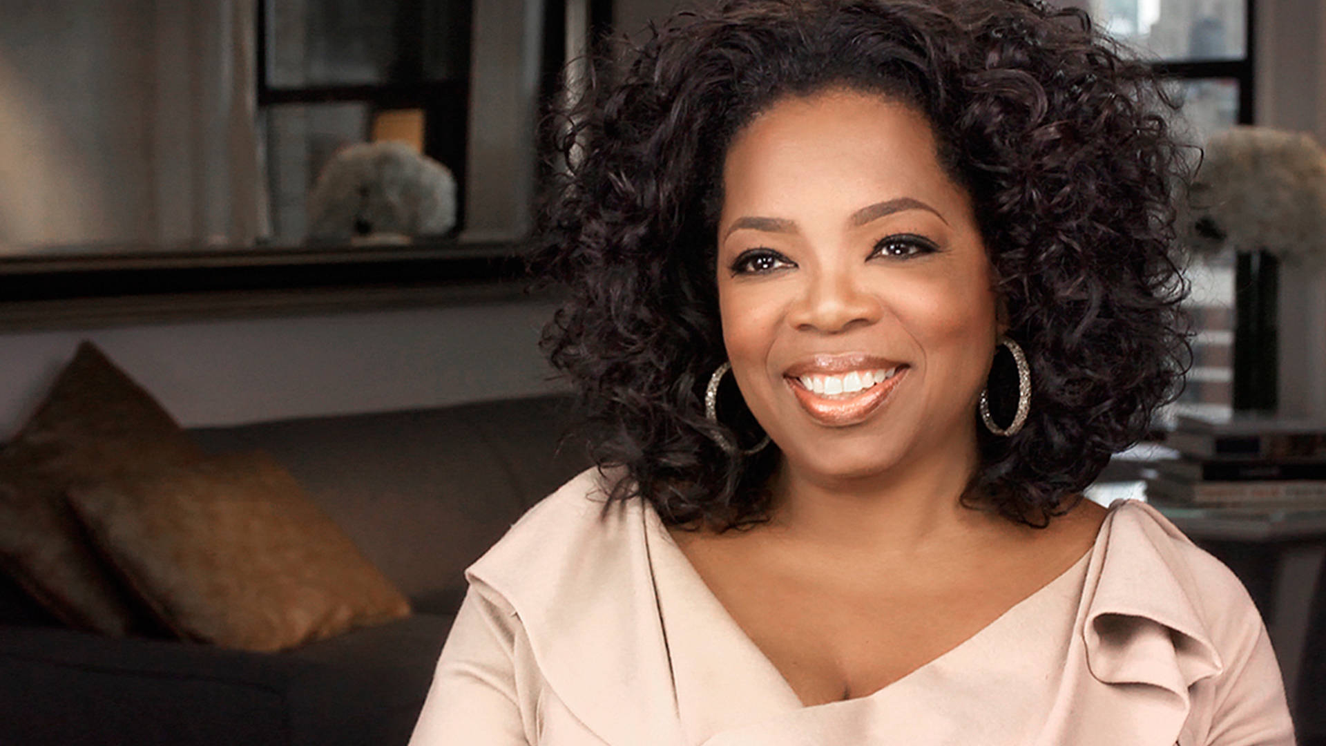 Oprah Winfrey, natural beauty, softly lit indoor setting, Full HD Desktop Wallpaper