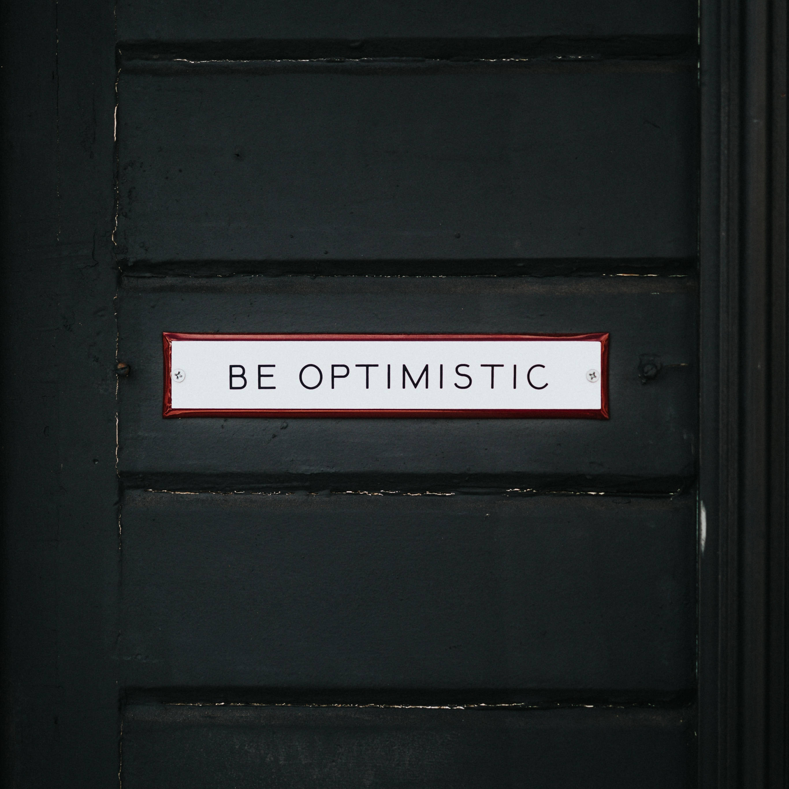 Optimistic, white sign, red border, 2K Desktop Wallpaper