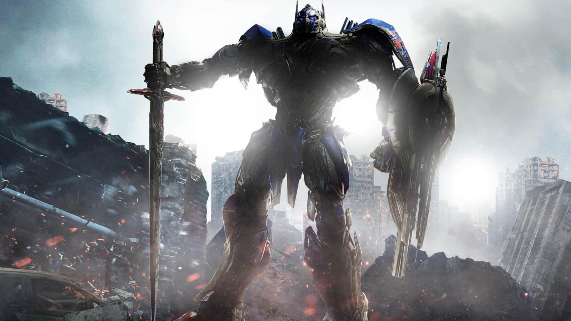 Optimus Prime, heroic stance, ruined cityscape, Full HD Desktop Wallpaper