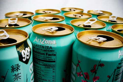 Arizona tea, teal Arizona green tea cans, gold tops, SD Desktop Wallpaper
