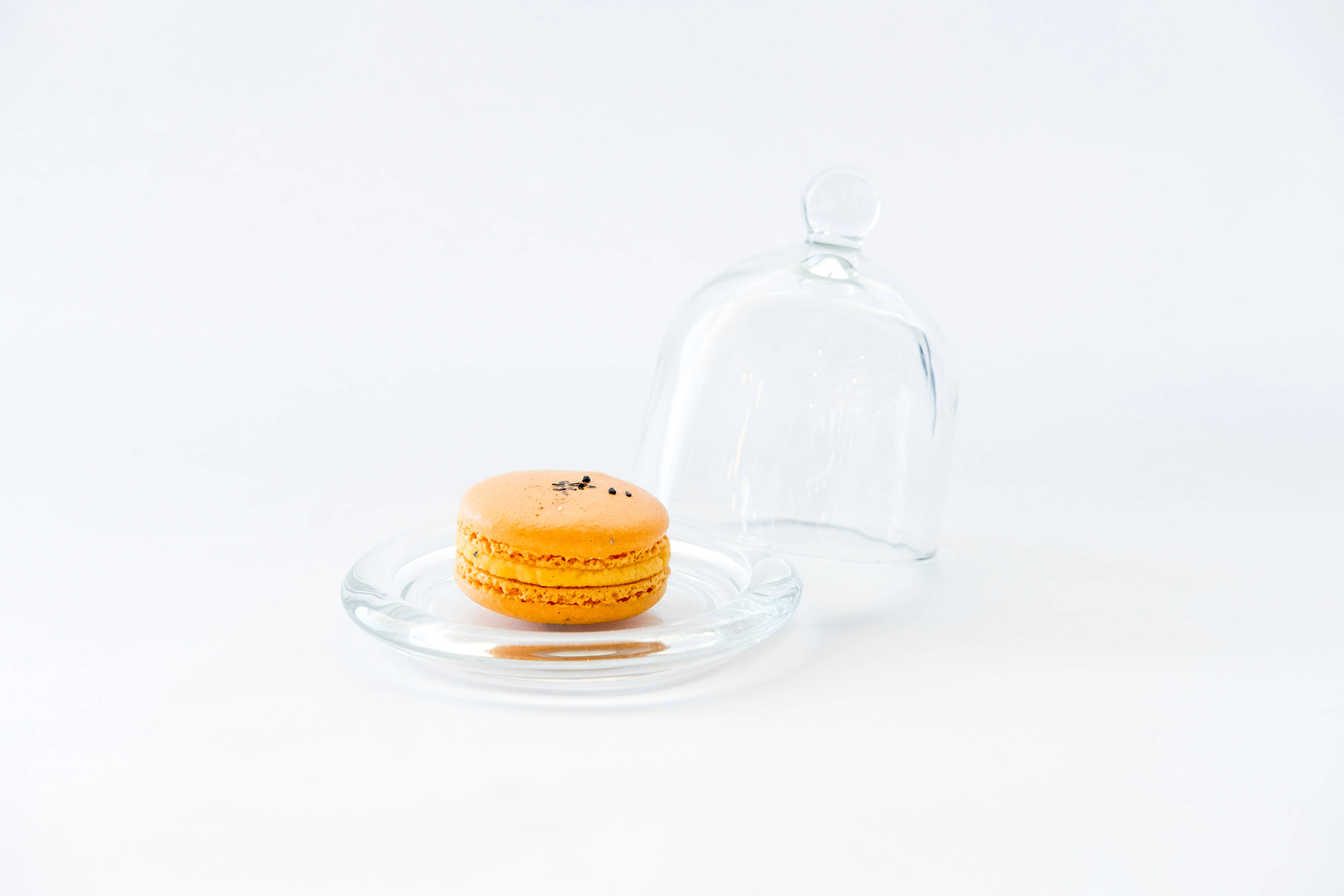orange macaron, glass plate, empty glass dome, 4K Desktop Wallpaper