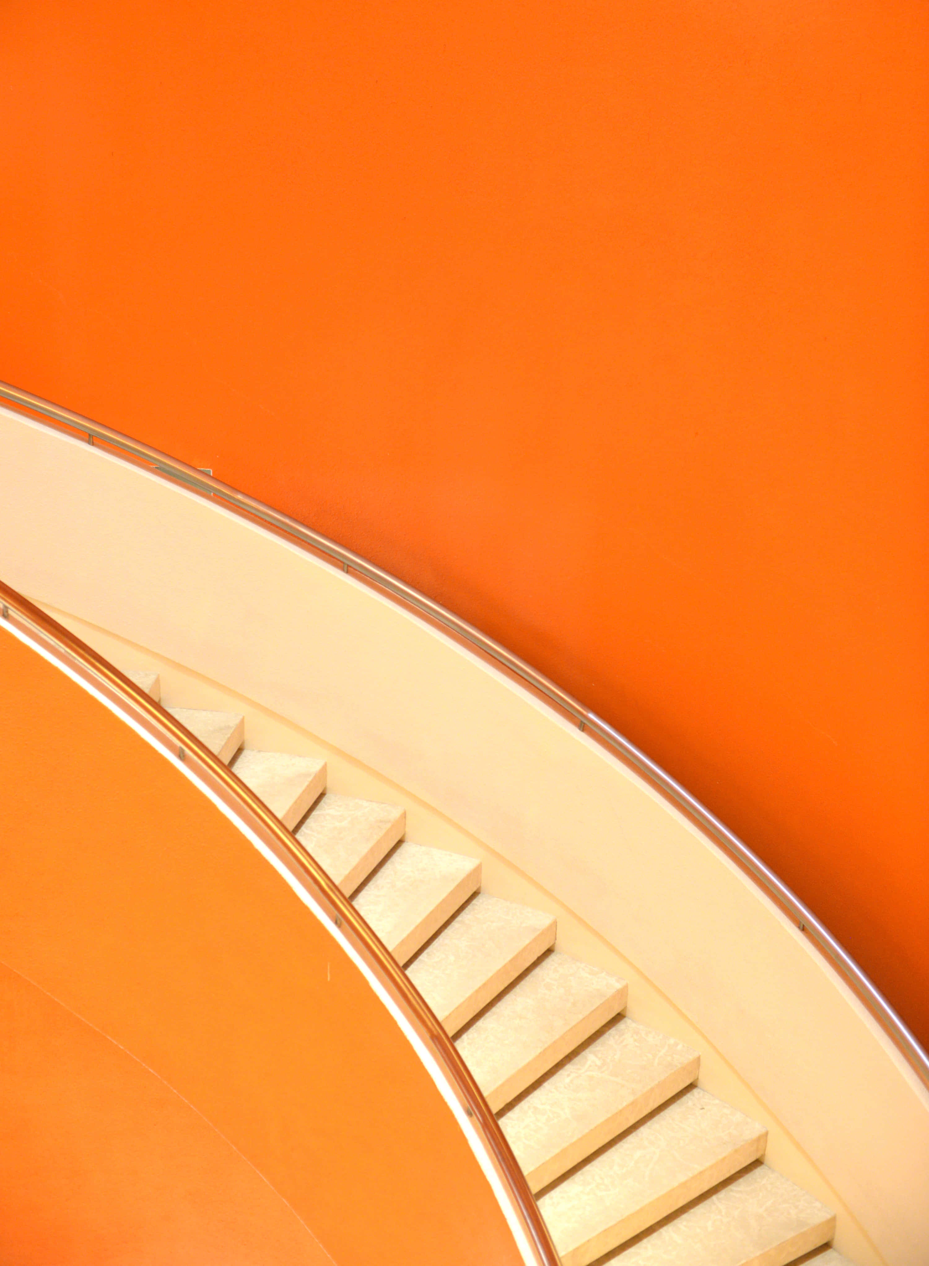 orange wall, curved staircase, cream steps, 4K Phone Wallpaper