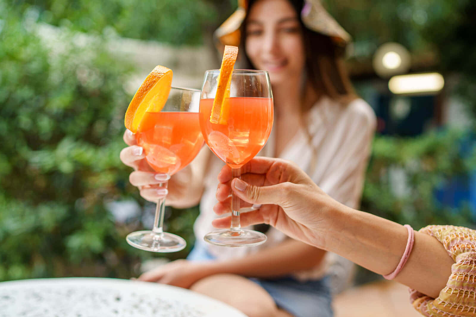 vibrant orange cocktails, citrus slices, sunlit garden setting, HD Desktop Wallpaper