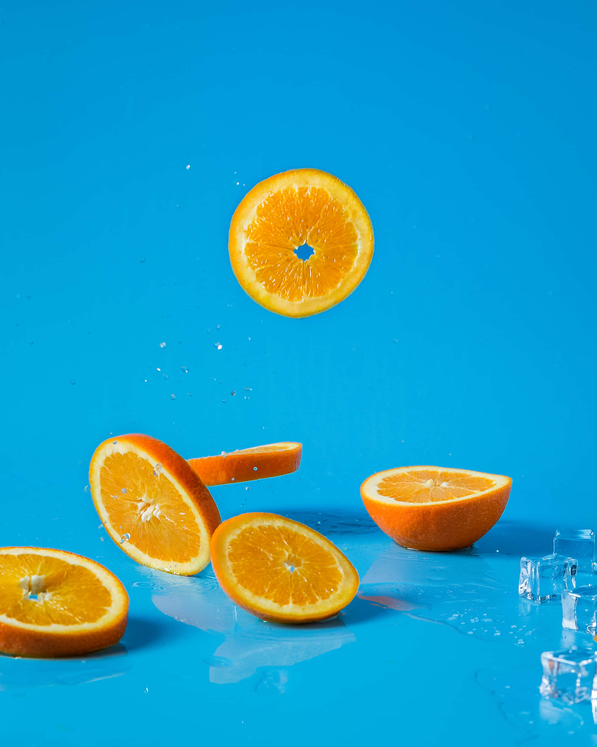 Orange iPhone, vibrant orange, vivid blue background, Full HD Phone Wallpaper